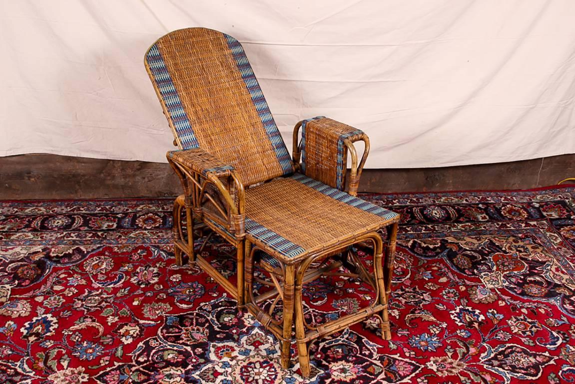Rattan frames with tan and blue striped wicker. The lounge with adjustable back and angular and curved stretchers. With a slide out ottoman below.
Ottoman measures: Depth 28