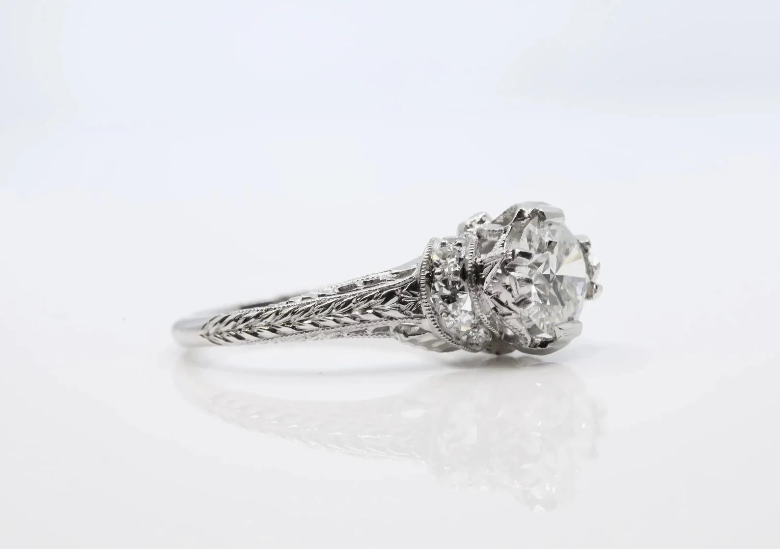 Round Cut 1920's Ribbon Motif Art Deco 0.76ct Diamond Engagement Ring in Platinum For Sale