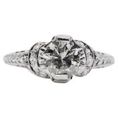 Antique 1920's Ribbon Motif Art Deco 0.76ct Diamond Engagement Ring in Platinum