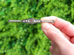 1920s Ruby and Diamond Onyx and White Gold Bar Brooch