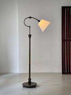 1920s Scandinavian art deco floor lamp in patinated bronze Just Andersen style.