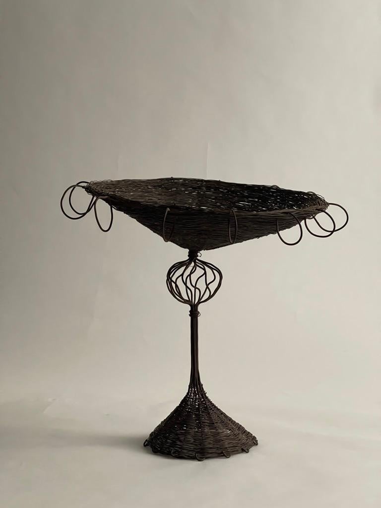 Rare early 20th century scandinavian piece in metal in the form of a compote bowl. This work attributed to Paavo Tynell early career as a skilled black smidth. 

While Tynell is most famous for his work with brass and copper, his early career saw