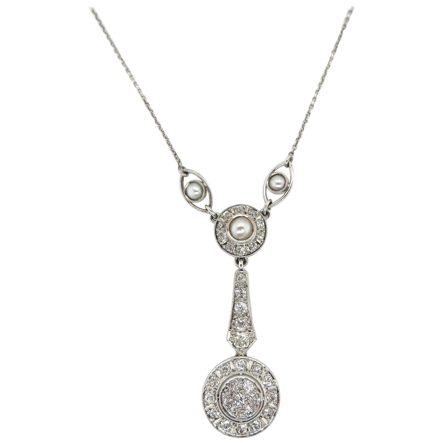 1920s Seed Pearl and 0.95 Carat Diamond Pendant For Sale