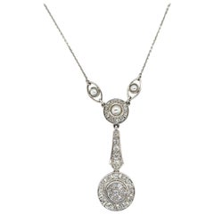 Antique 1920s Seed Pearl and 0.95 Carat Diamond Pendant