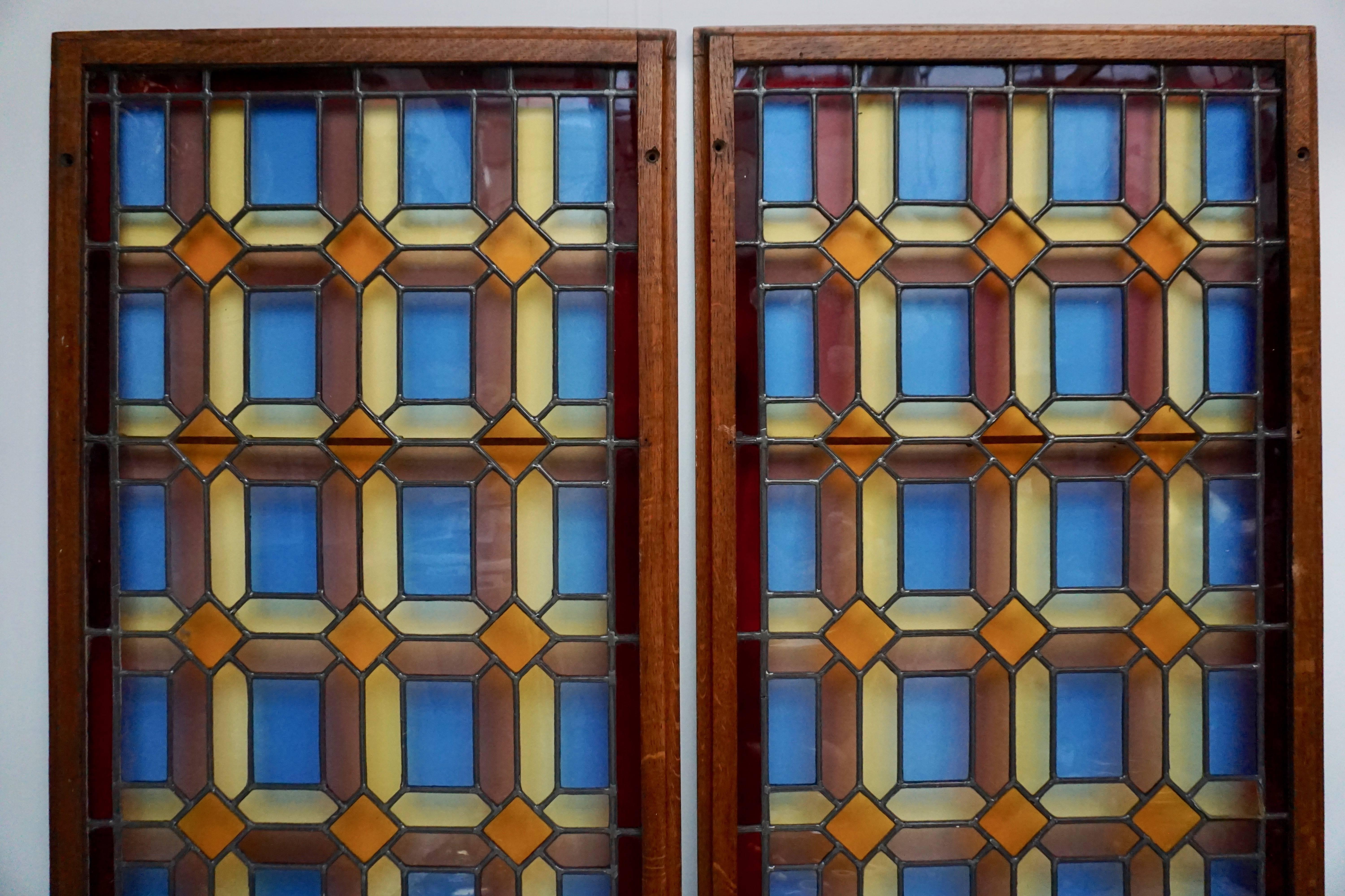 One of Two Multicolored Stained Glass Windows Panels 1