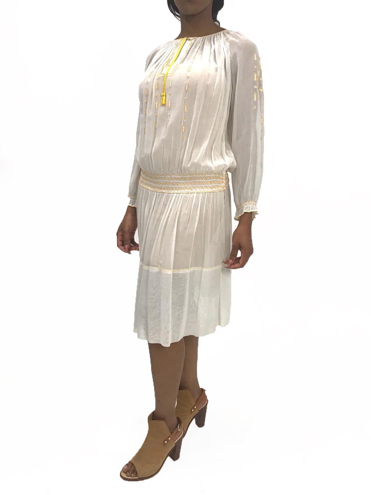 1920S Sheer Cotton Boho Folk Dress With Yellow Hand Embroidery & Smocking In Excellent Condition For Sale In New York, NY