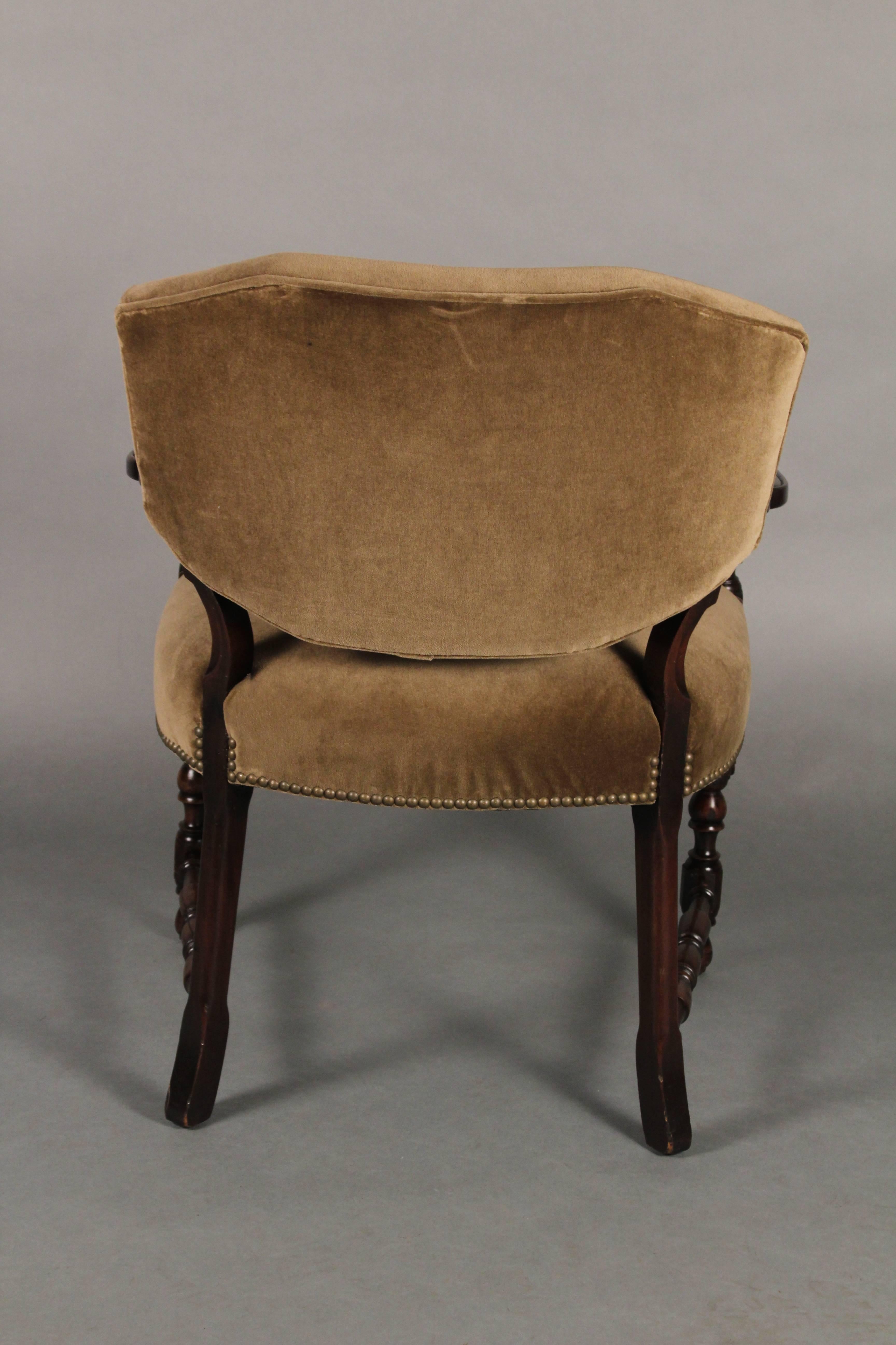 Classic 1920s upholstered side armchair with new velvet upholstery.
