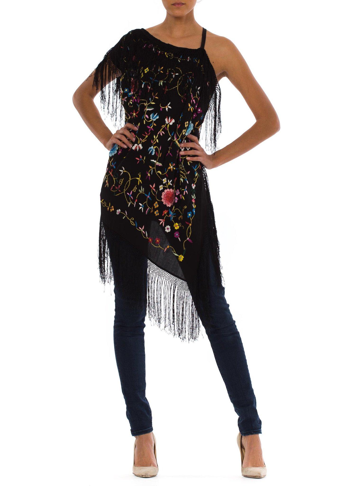 Black Rayon Hand Embroidered Asymmetrical Piano Shawl Top With Fringe
MORPHEW COLLECTION is made entirely by hand in our NYC Ateliér of rare antique materials sourced from around the globe. Our sustainable vintage materials represent over a century