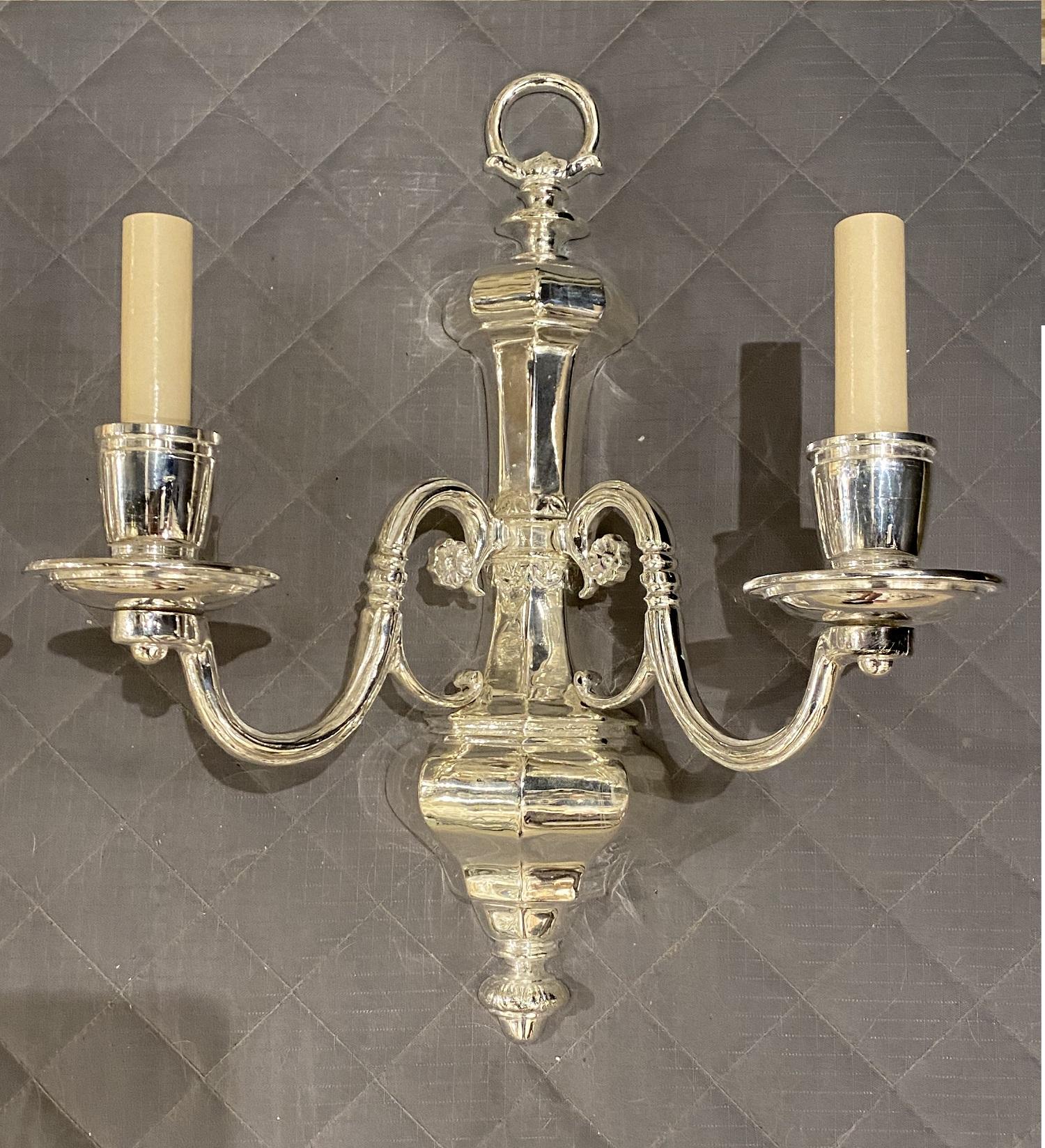 A pair of circa 1920’s Caldwell sconces silver plated finish 