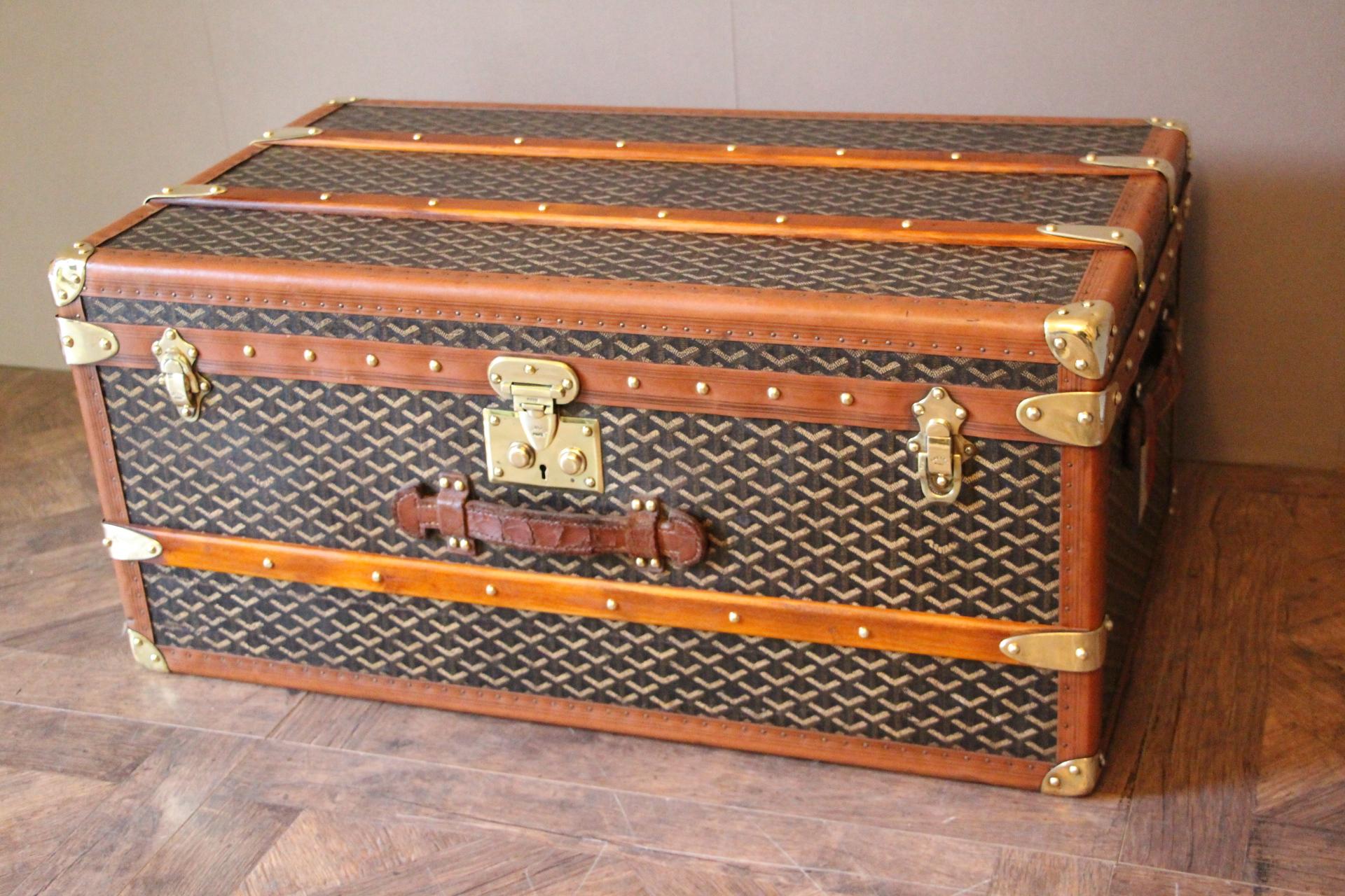 This beautiful small Goyard cabin trunk features the famous 