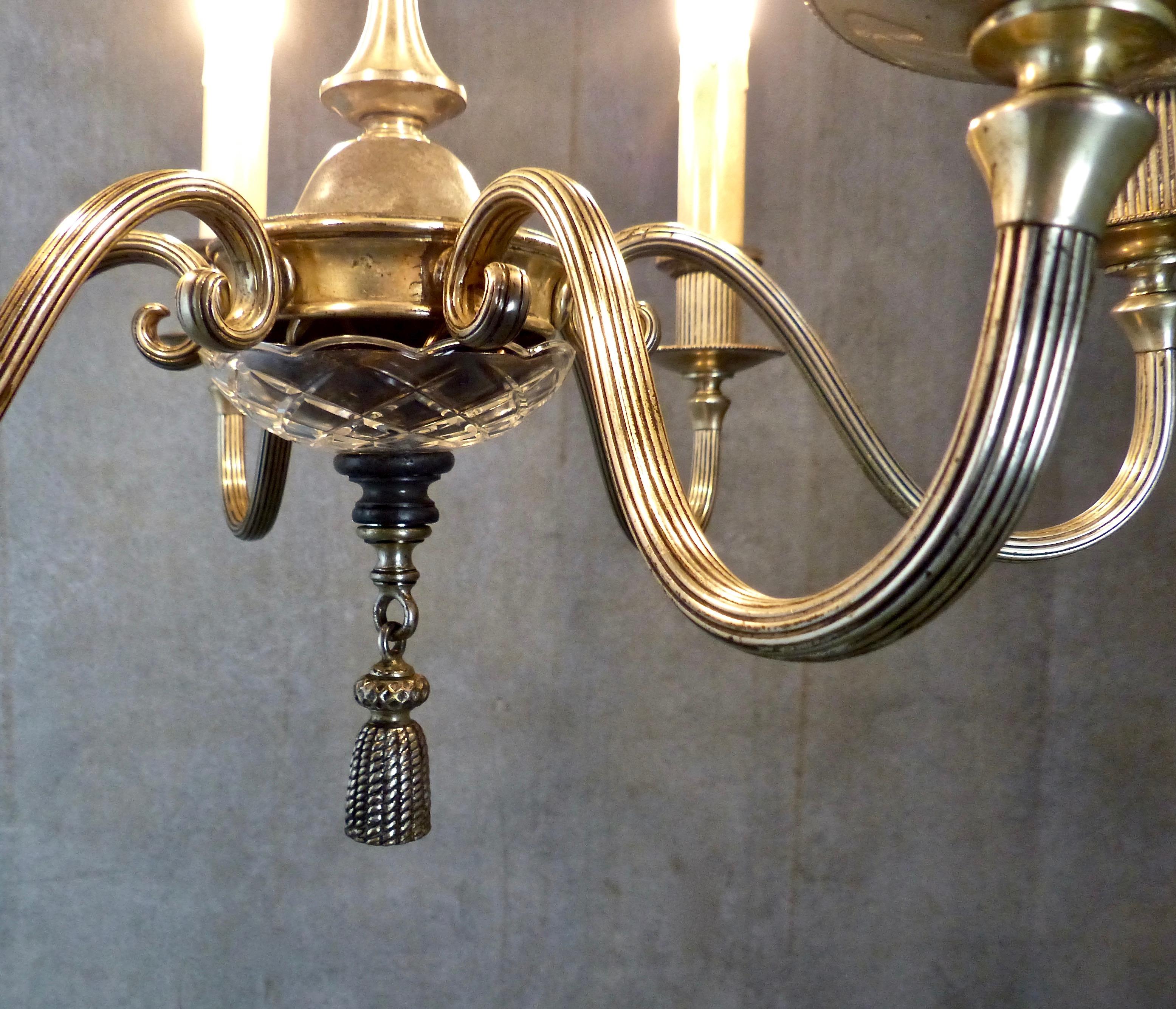 A silver-gilded, small chandelier from the Art Deco period. Acquired in New York City, and fully re-wired/restored and CSA approved to current electrical standards. An agreeable chandelier that looks good in any location, adding just the right