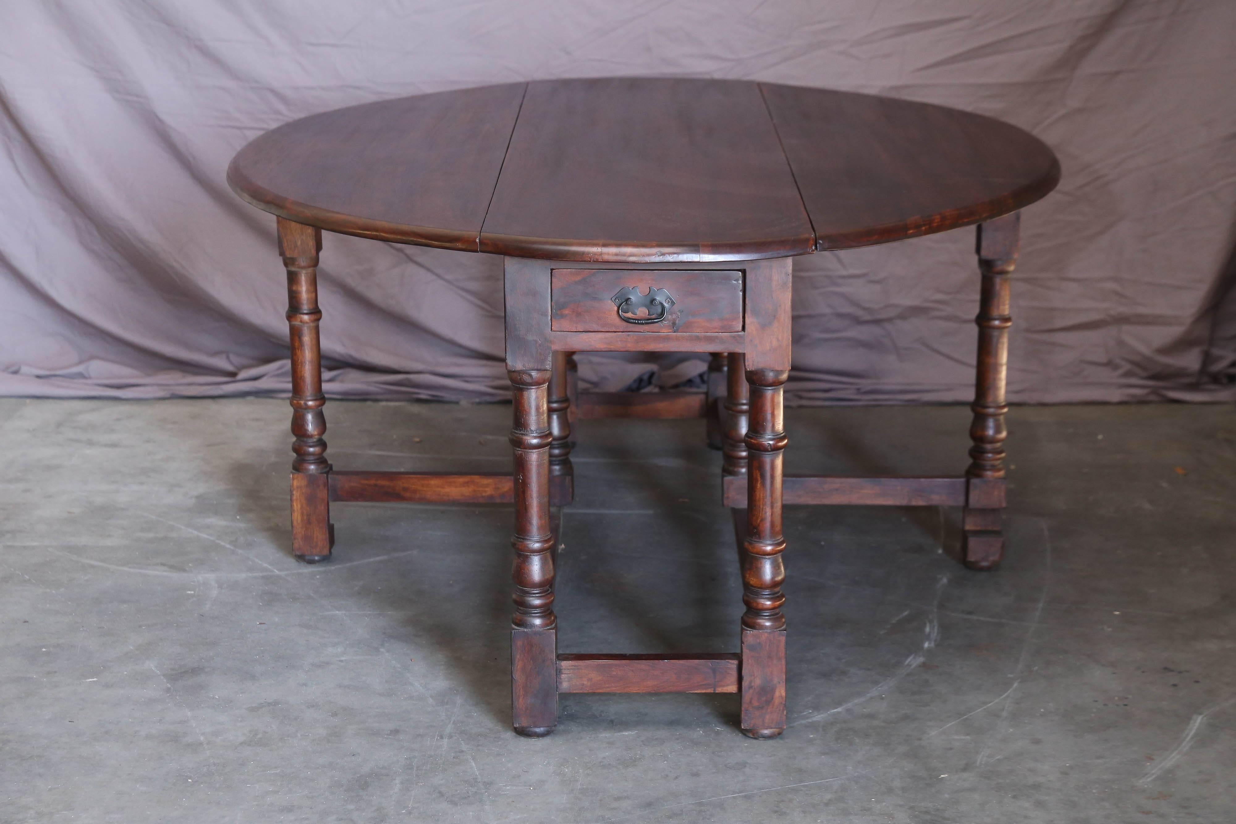 Hand-Crafted 1920s Solid Teak Wood British Colonial Gate Leg Breakfast Table For Sale