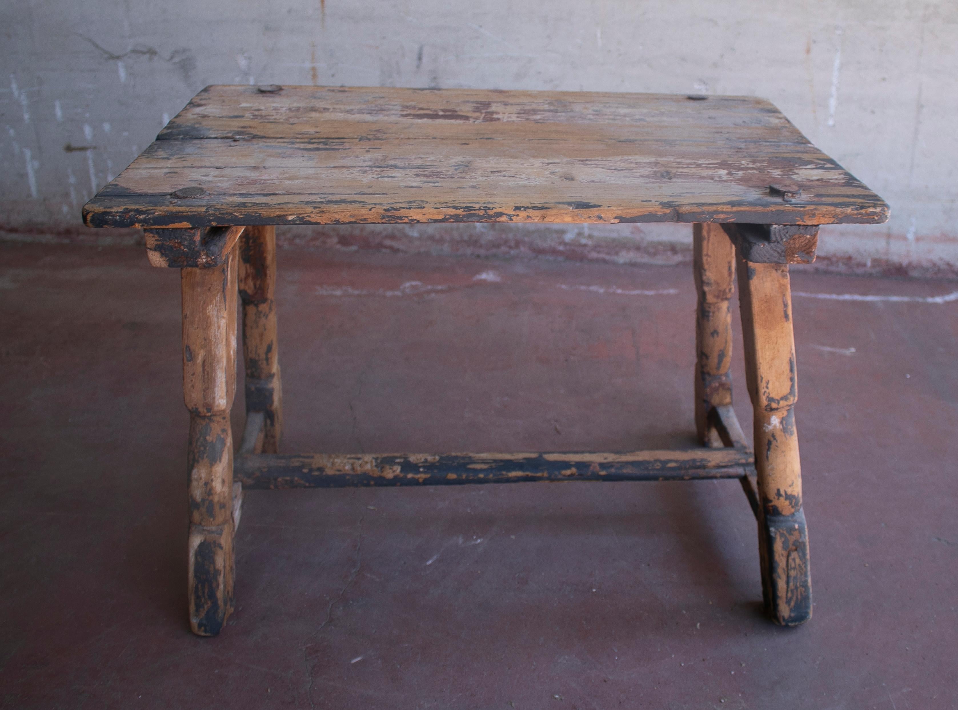 Rustic 1920s Spanish farmhouse wooden side table.