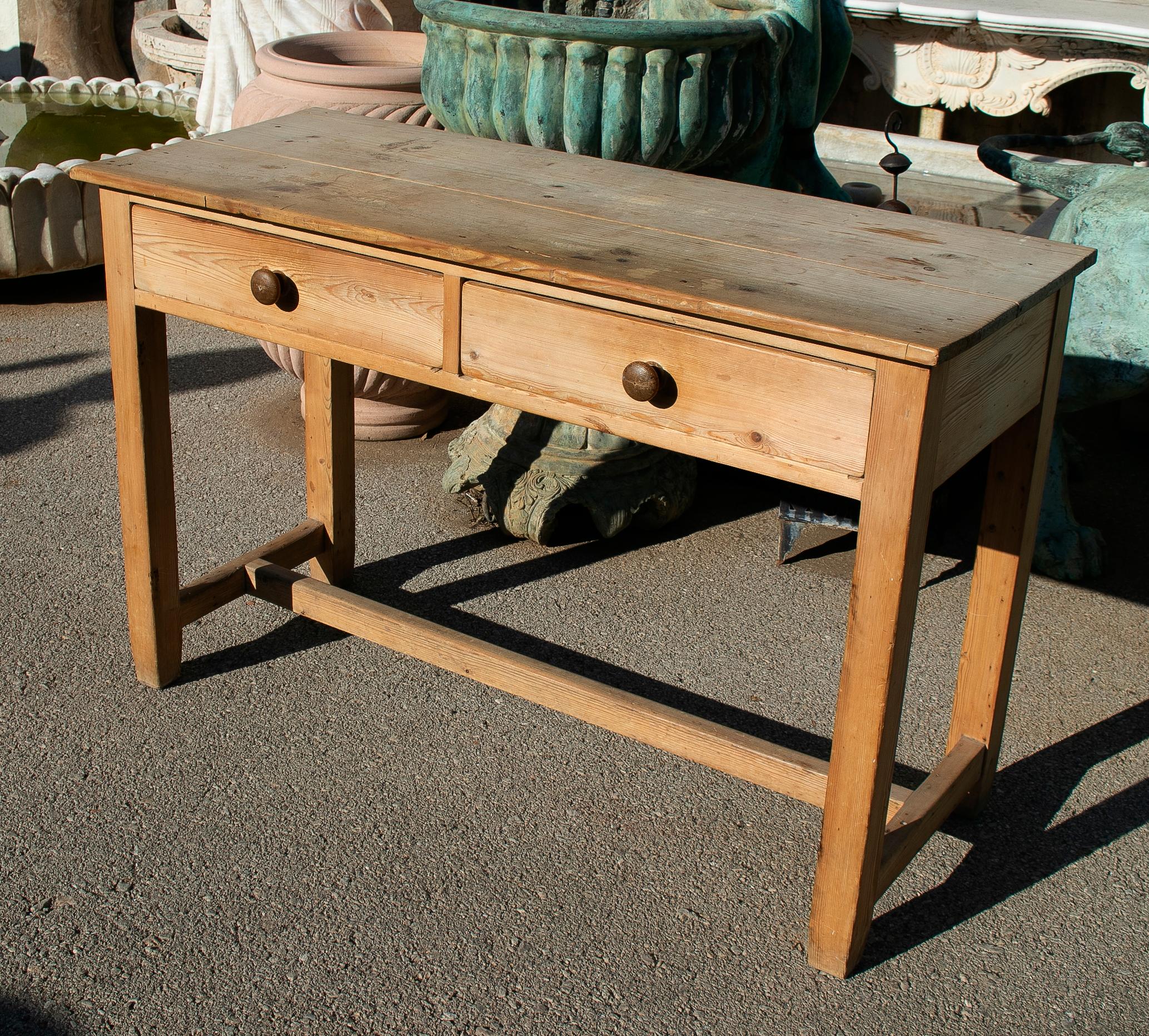 1920s Spanish rustic two-drawer country farm wooden table.