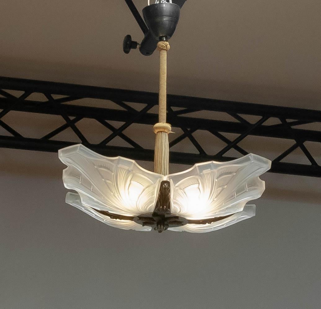 Beautiful Art Deco chandelier / up-light with four large Art Glass scales. Together the scales give the chandelier a square shape making this a impressive chandelier. mounted to the rod are four screw fittings ( from a later period ) size E27 / E28.