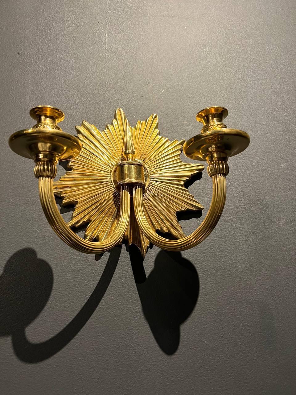 A pair of circa 1920’s gilt bronze double light sconces 
