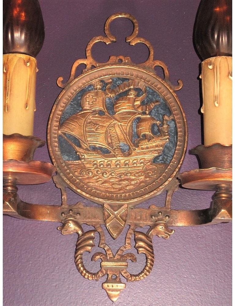 Cast 1920s Tall Ship Sconces in Bronze Original Finish and Patina Priced Per Pair For Sale