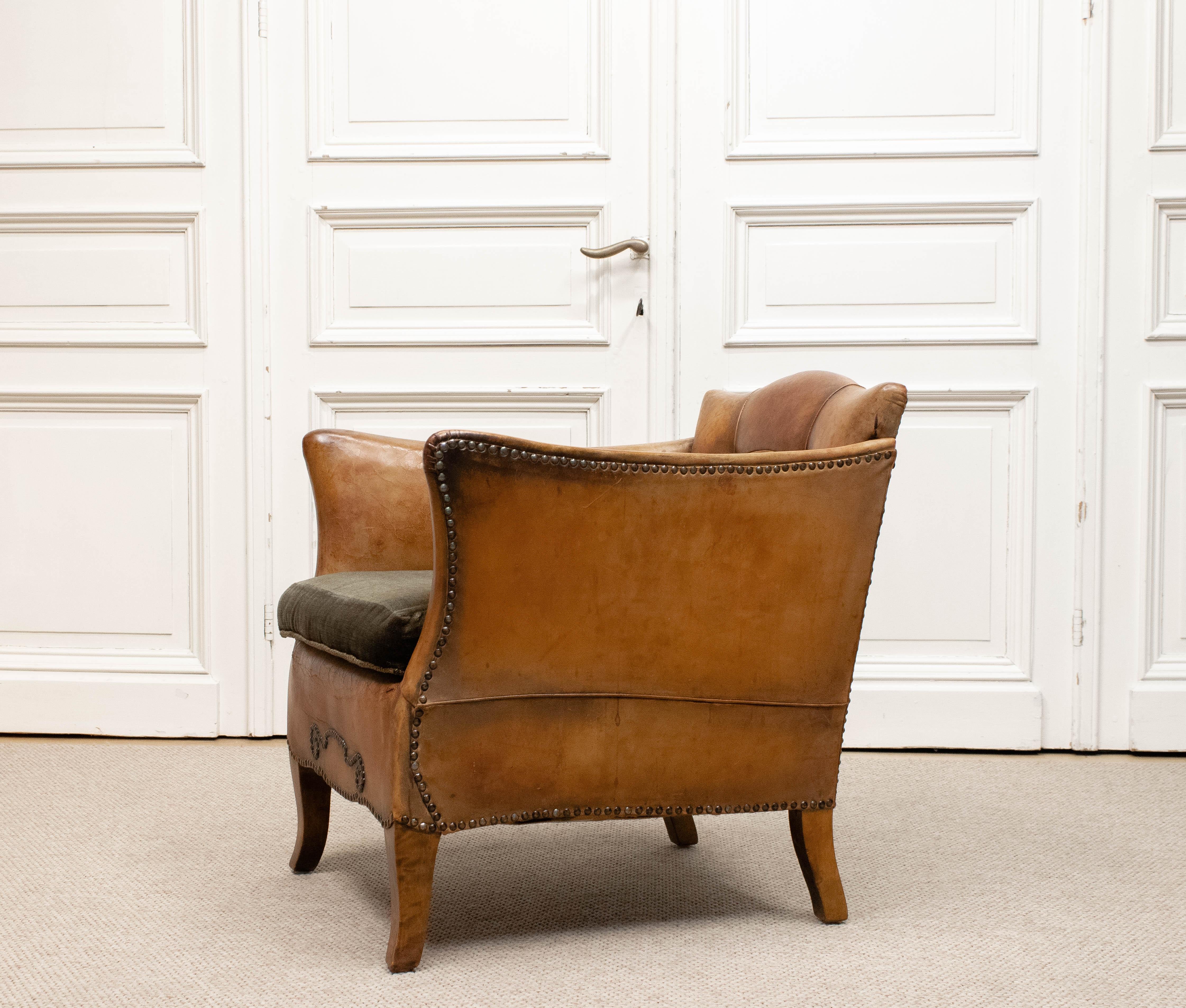Cuir Fauteuil club en cuir fauve des années 1920 attribué à Otto Schulz pour Boet Suède en vente