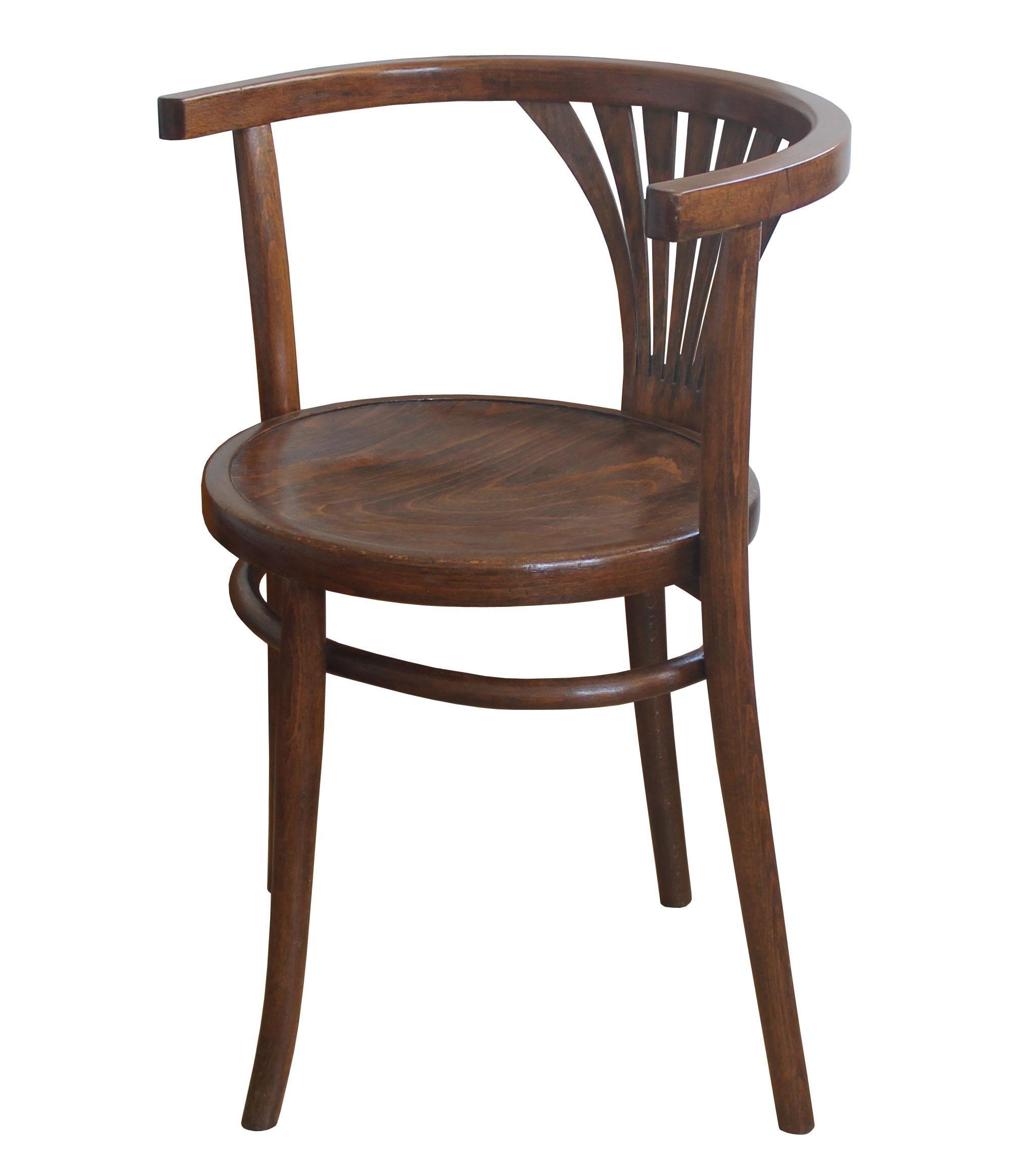 This dining chair was originally designed by the Thonet company in 1904, as model No. 28. This particular piece is believed to be made by Thonet in one of their factories in former Czechoslovakia around 1920.

This piece has got an interesting