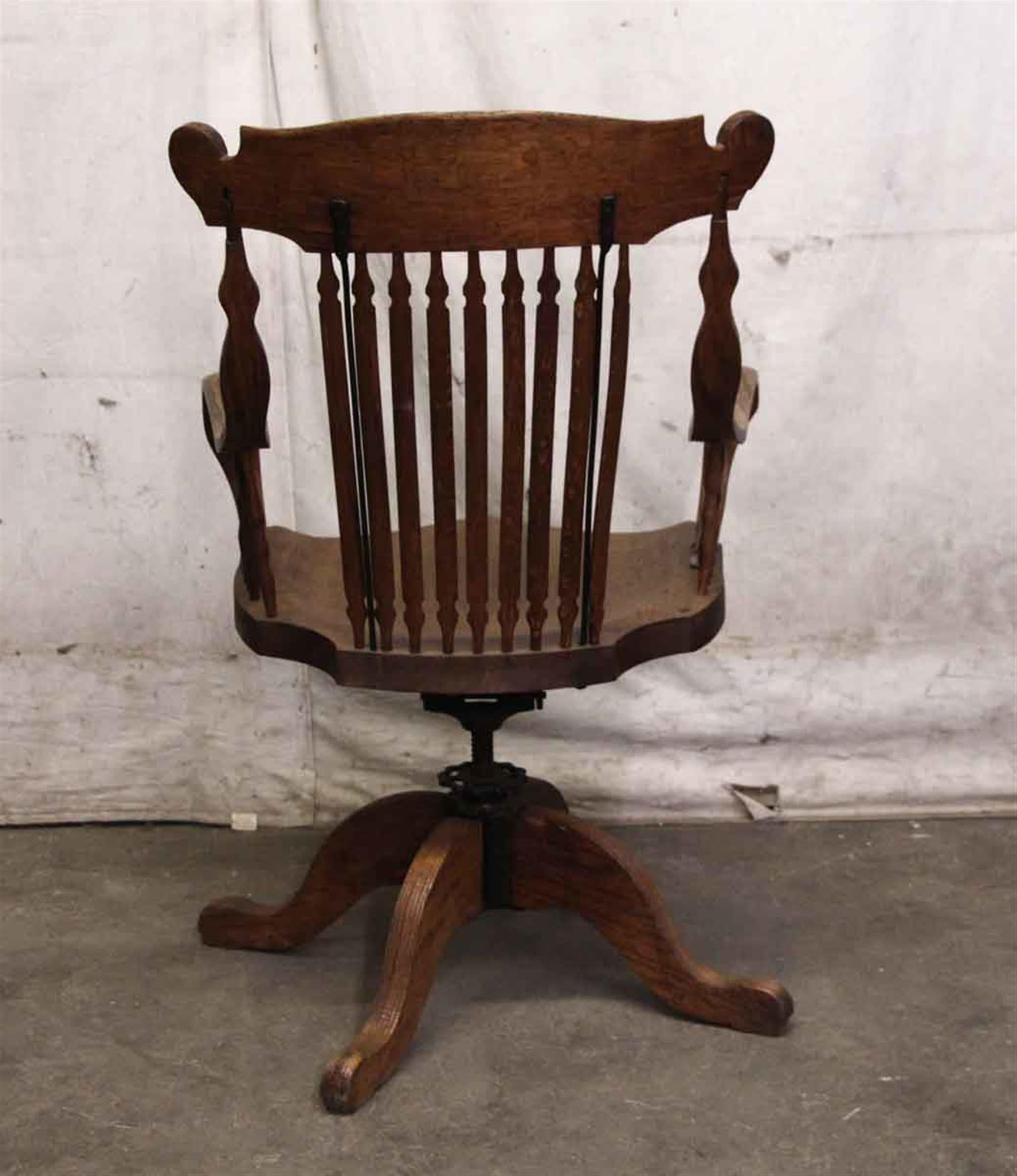 Carved 1920s Tiger Oak Spindle Back Adjustable Swivel Chair with Bentwood Arms