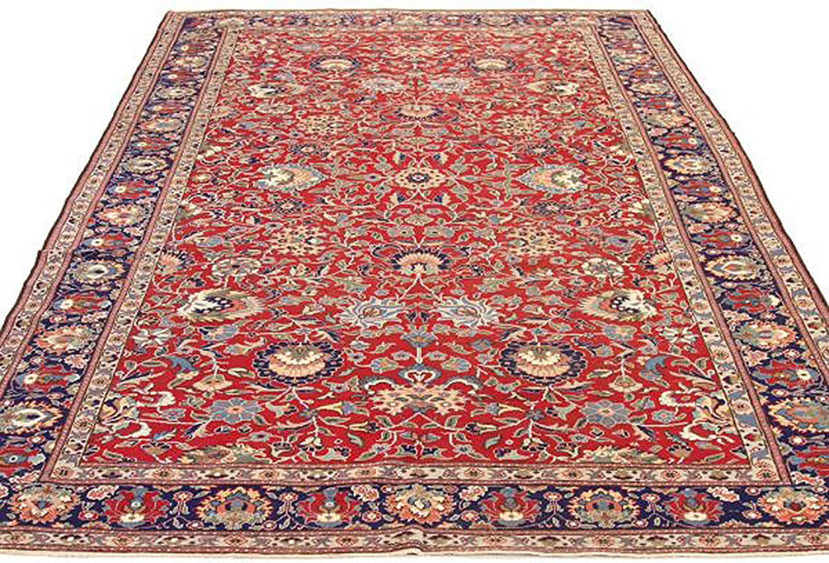 Persian 1920s Turkish Sivas Rug with Navy and Gray Floral Motifs on Red Field For Sale