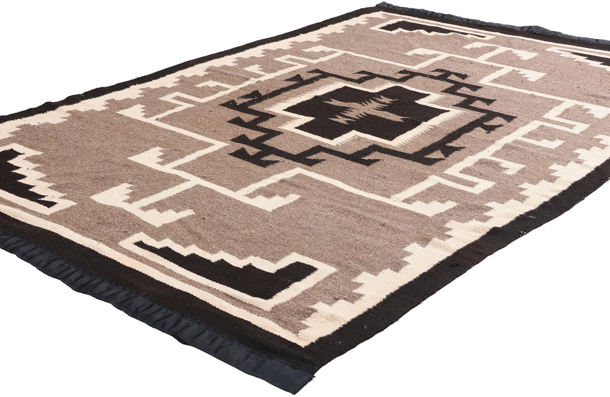79135 Antique Two Grey Hills-Inspired Southwestern Flatweave  Early 20th Century Elegance in Handspun Wool, 04'05 x 07'01. A paragon of early 20th-century Southwestern textile artistry, this exceptional handwoven wool kilim evokes the renowned