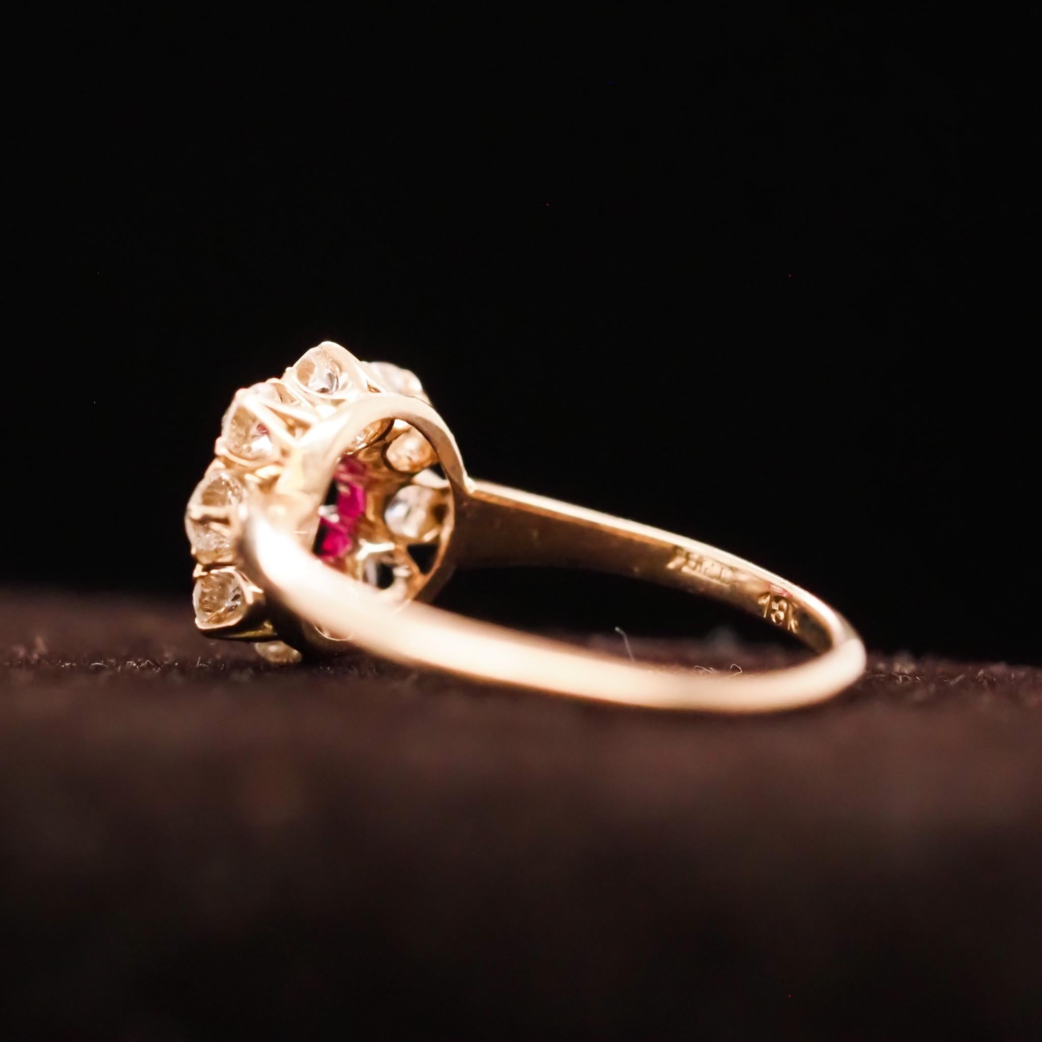 Year: 1920s
Item Details:
Ring Size: 7.5
Metal Type: 18K Yellow Gold [Hallmarked, and Tested]
Weight: 2.8grams
Ruby Details: .50ct, Unheated, Natural Ruby, Burmese
Side Stone Details: Old Mine Brilliant, F-G VS Color
Band Width: 2.9mm
Condition: