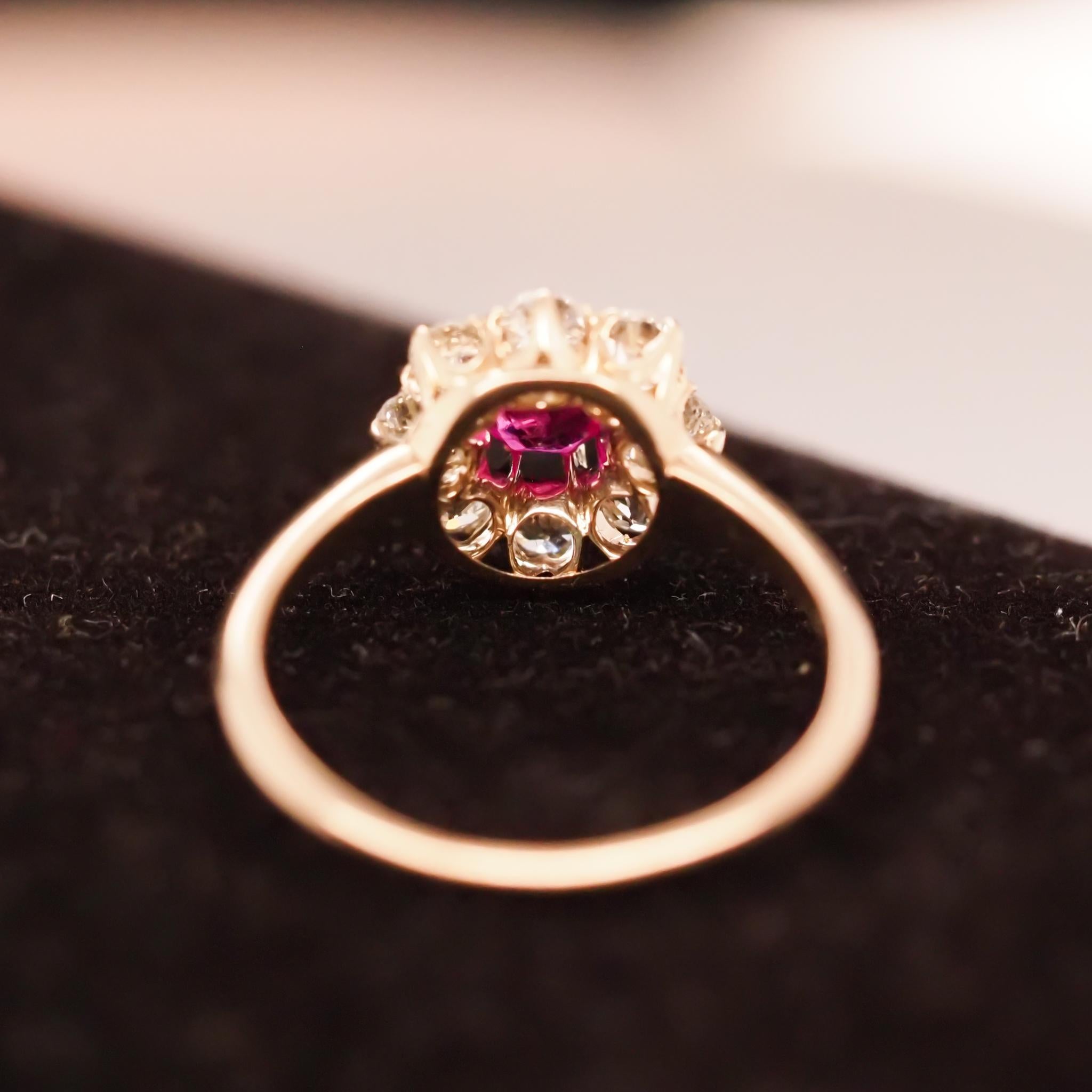 Edwardian 1920s Unheated Natural Ruby 18 Karat Yellow Gold Old Mine Diamond Halo Ring For Sale