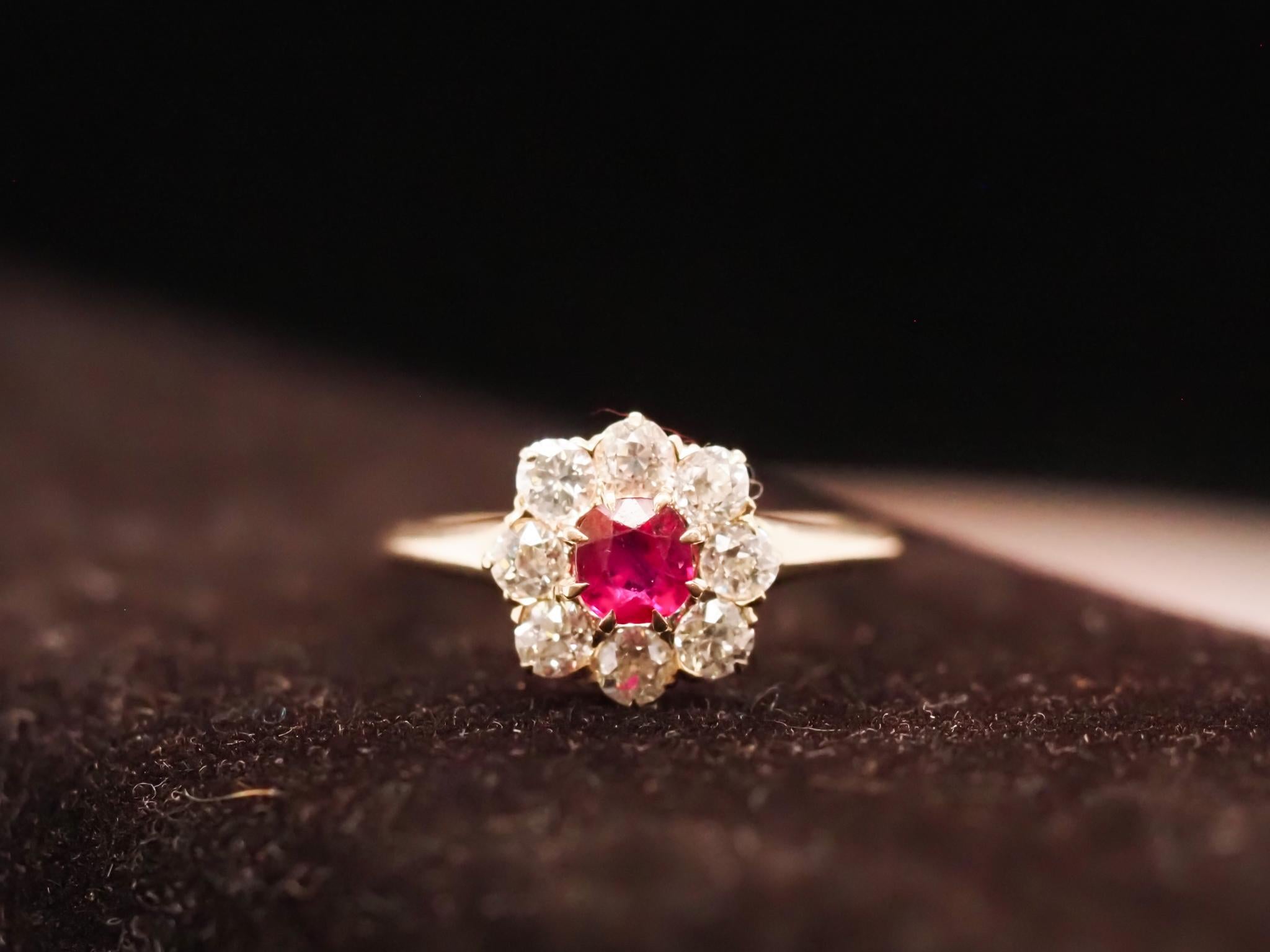 Women's 1920s Unheated Natural Ruby 18 Karat Yellow Gold Old Mine Diamond Halo Ring For Sale