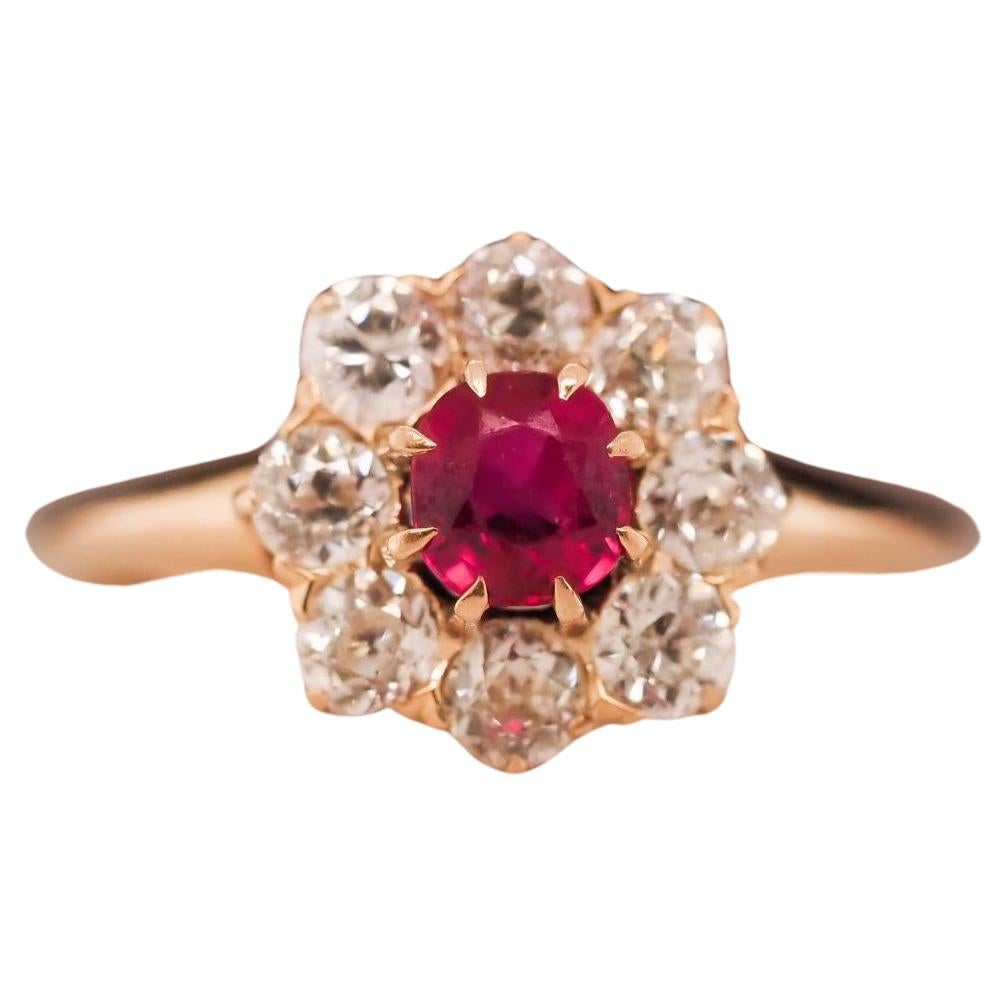 1920s Unheated Natural Ruby 18 Karat Yellow Gold Old Mine Diamond Halo Ring For Sale