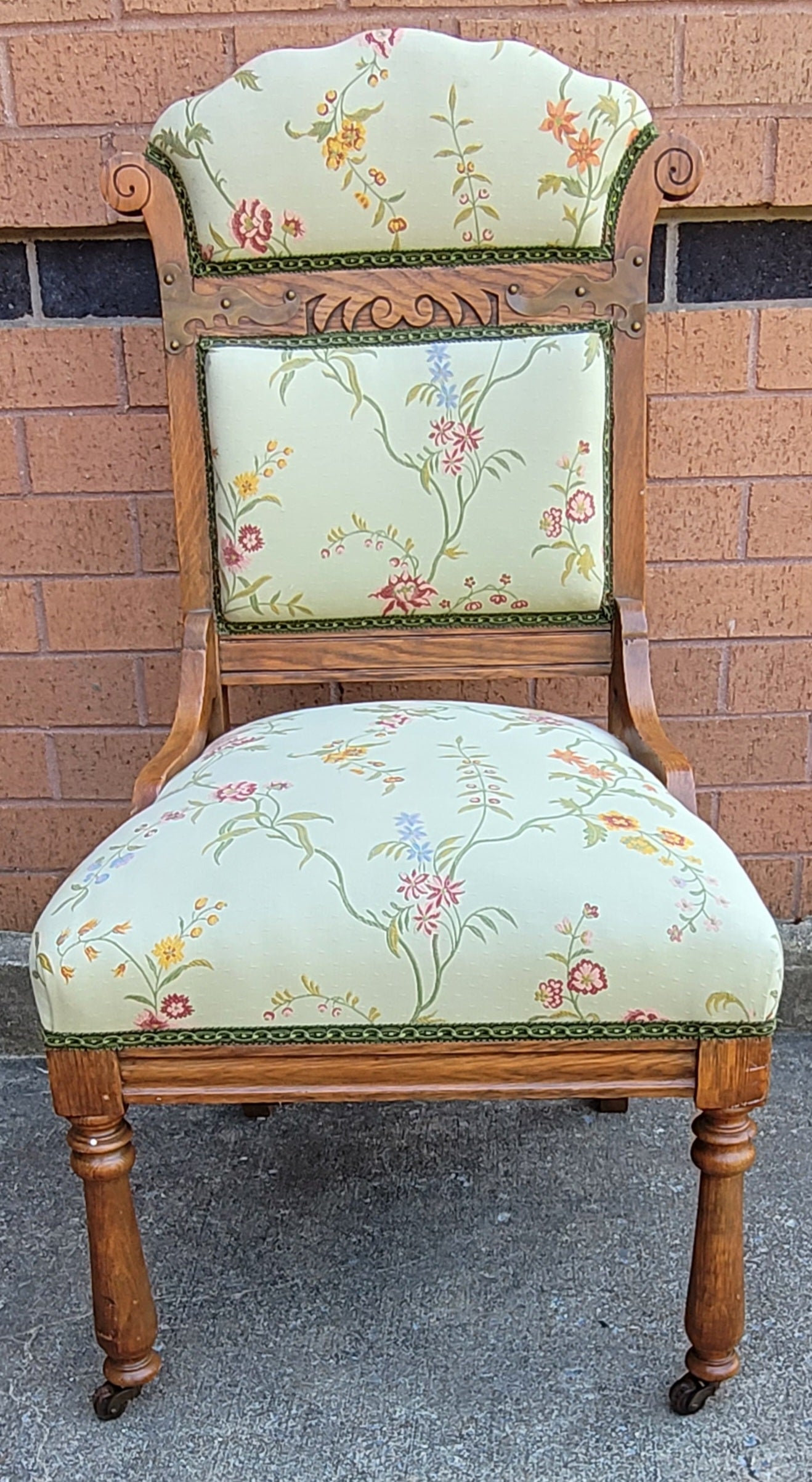 A beautiful pair of 1920s Victorian Oak Upholstered Parlor Side Parlor Chairs in very good condition. Have been refinished and reupholstered. Very firm seats. Very clean. No stain. One chair Measures 19