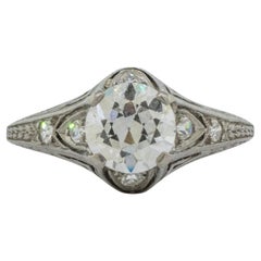 Bague de fiançailles vintage des années 1920 avec sertissage original en platine