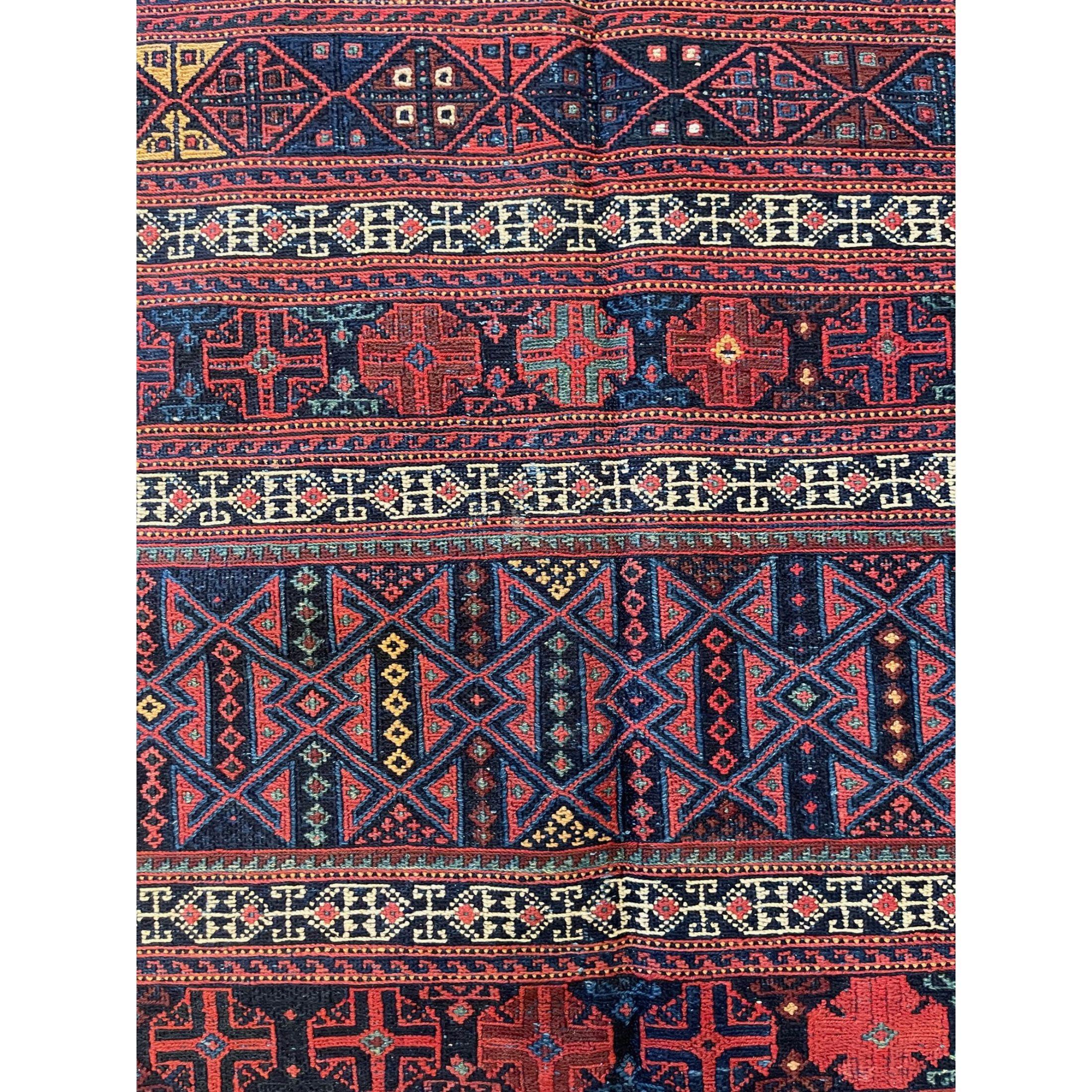 oumak rugs (also spelled Sumak) – This construction technique produces a flat-weave rug that is thick, strong and exceptionally durable. Unlike kilims, Soumak rugs are not reversible because non-clipped yarns are left on the back. However, they are