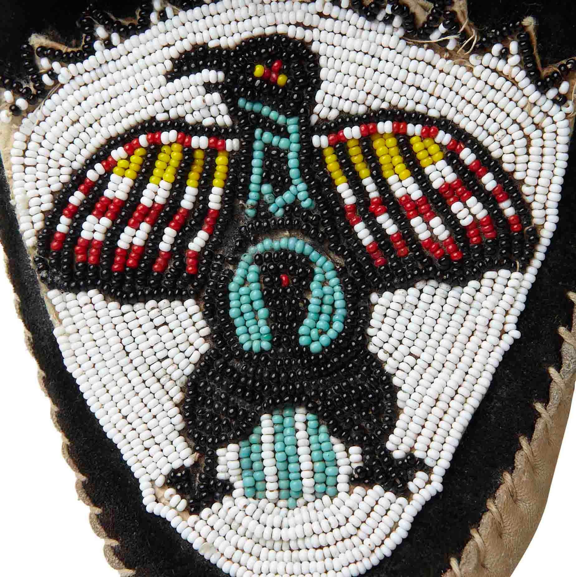 Product Details: Hand Beaded - Native American - Suede Moccasins - Leather Front Tie - Sheepskin Lining - Leather Soles 
Artist: Unknown 
Era: c.1920
Fabric Content: Suede - Hand Beading - Leather - Sheepskin
Size: UK 5
Condition: Rare - Collectors