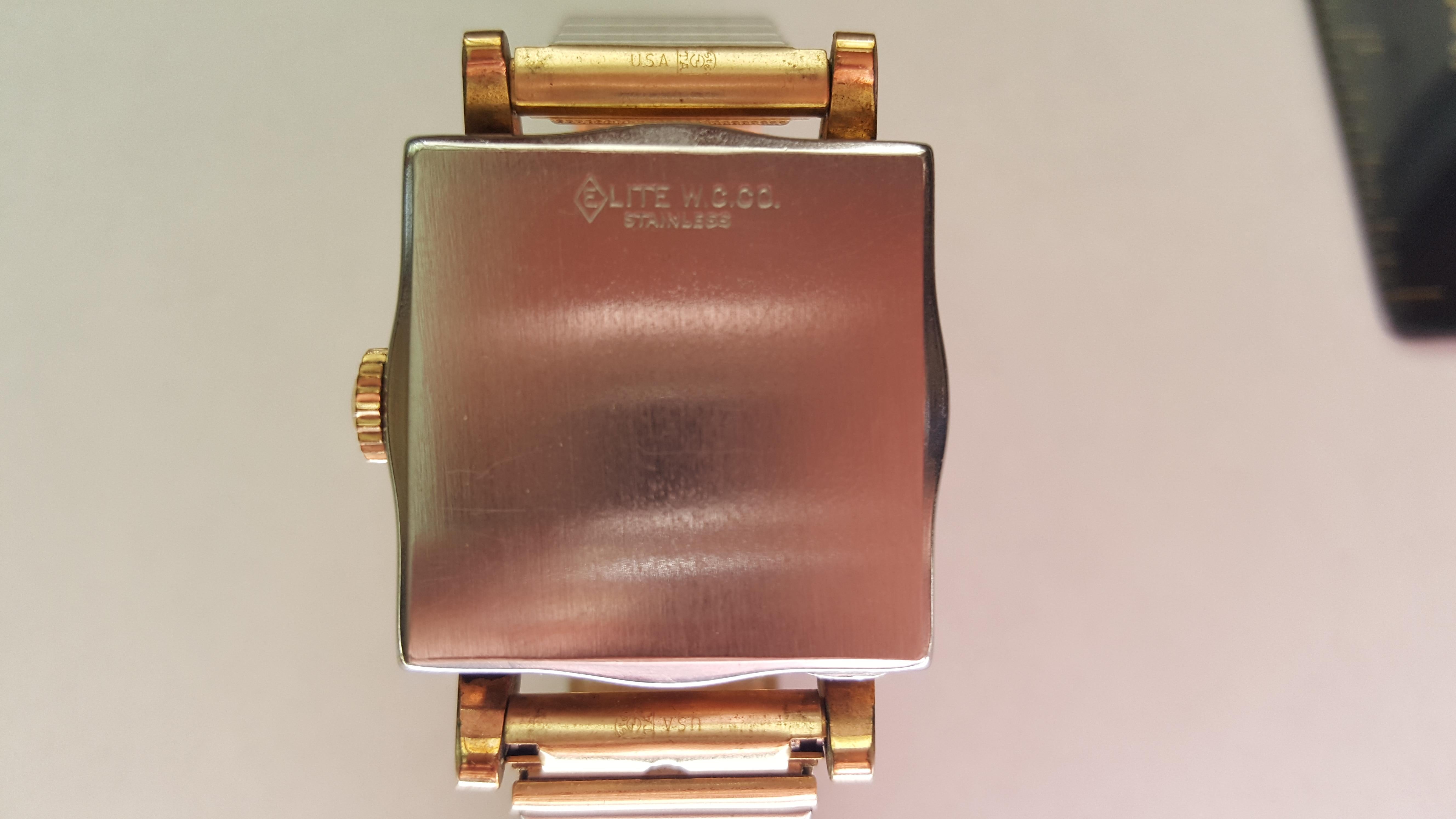 10kt gold plated Vintage Illinois Watch  twenty-six mm square case with sixteen mm Bracelet, Expandable Bracelet. The time period of this watch is estimate, however Illinois Watch company was in business from late 1800's through the 20th. The face