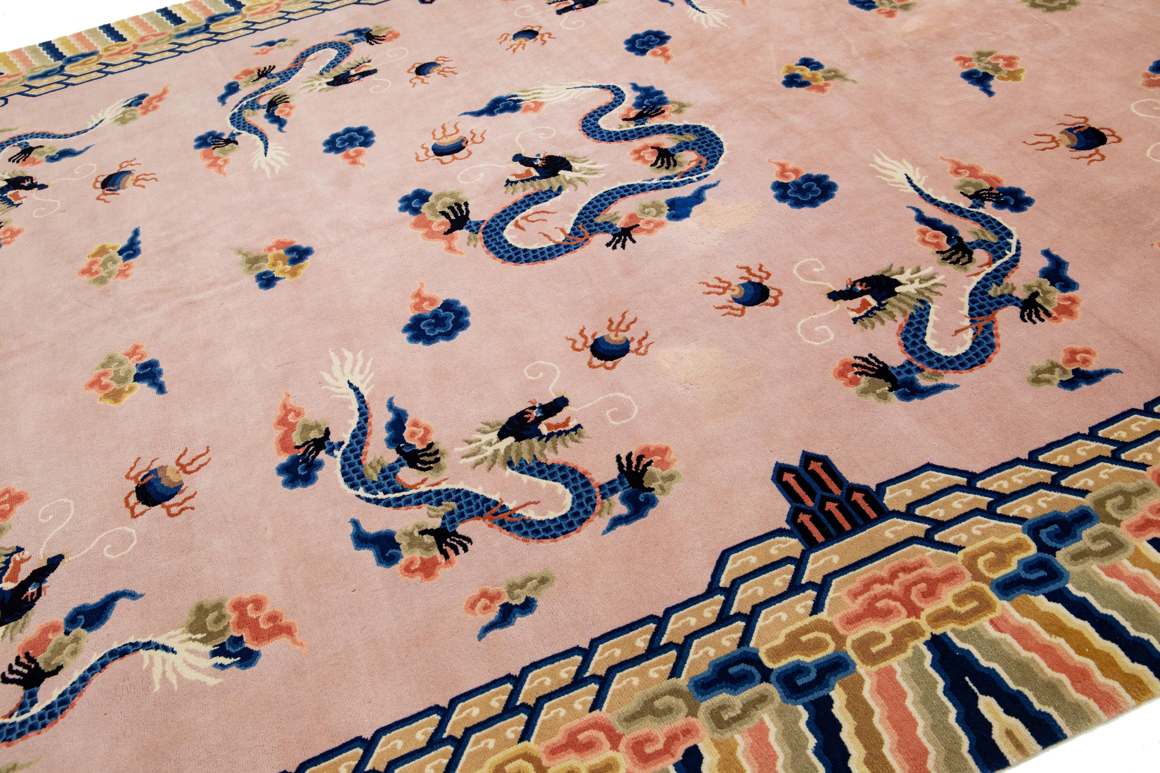 Hand-Knotted 1920s Vintage Peking Wool Rug Handmade In Light Pink with Classic Chinese Design For Sale