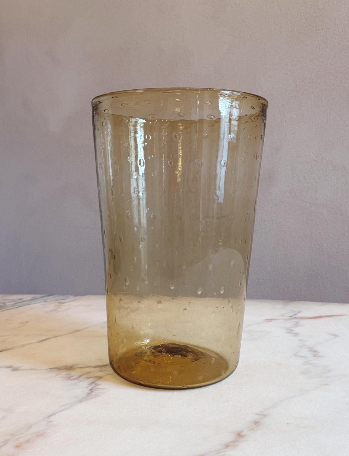 A wonderfully fine extra-large pale yellow hand-blown Murano glass vase by Vittorio Zecchin made in the 1920s. This tall vase is in very good condition. It has decorative 'bolle' air bubbles throughout and sits beautifully alongside our other