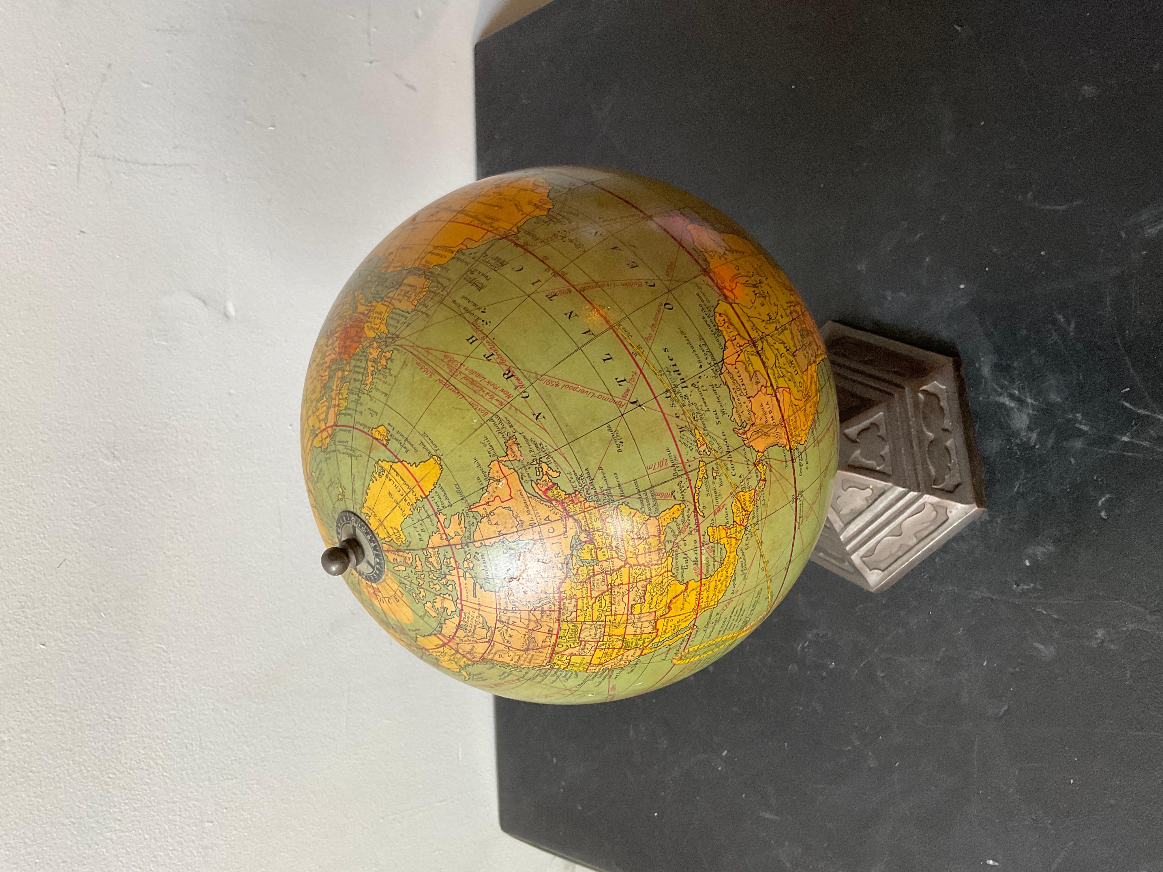 1920s Weber Costello 8” globe, printed in England. Iron base. Some imperfections on globe as shown in pictures.