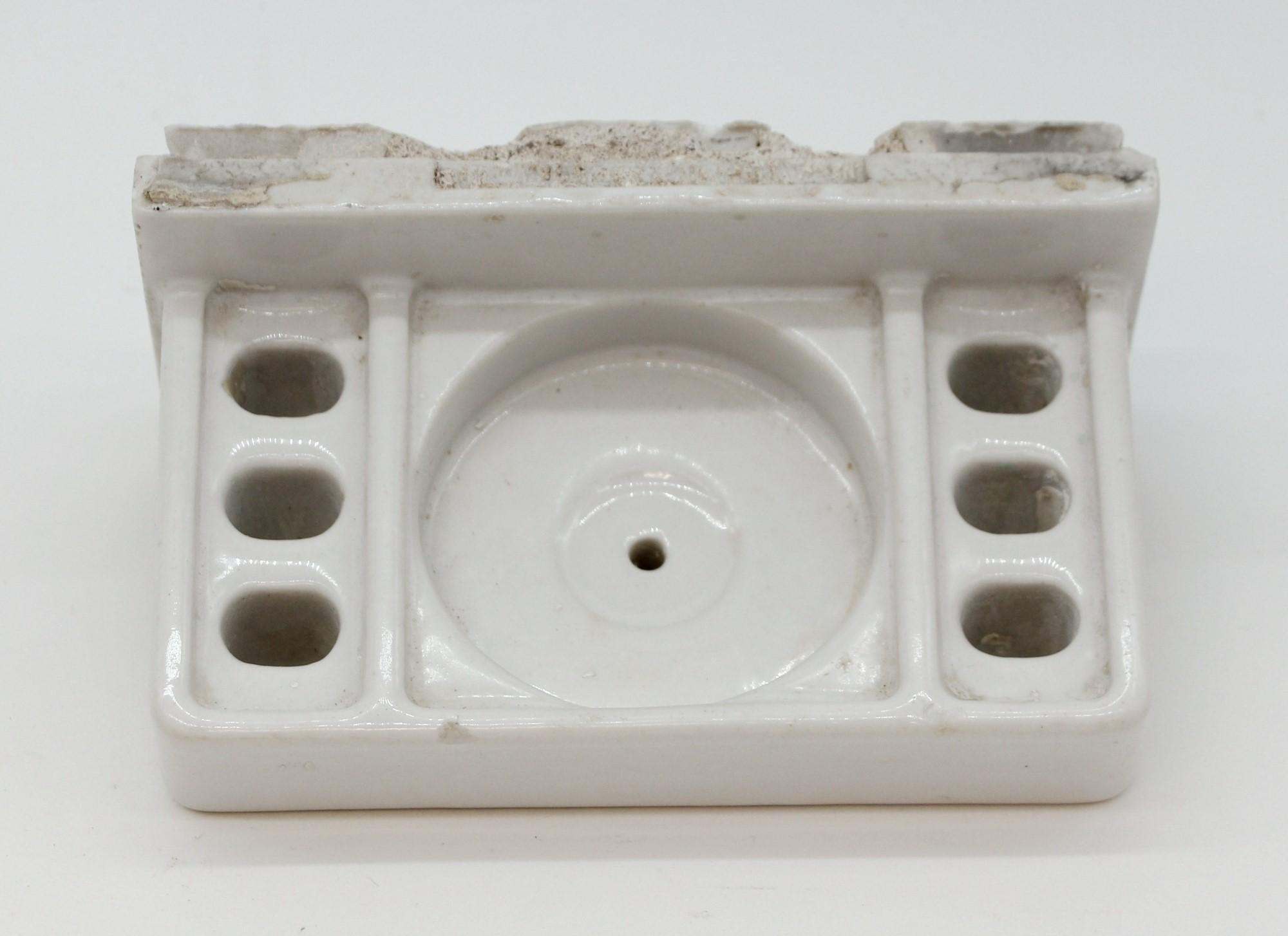 Original NYC 1920s flush mount ceramic toothbrush and cup holder. Recovered from bathrooms that made matching 3 x 6 subway tiles. These were typical in NYC tenement bathrooms where white 3 x 6 ceramic 
