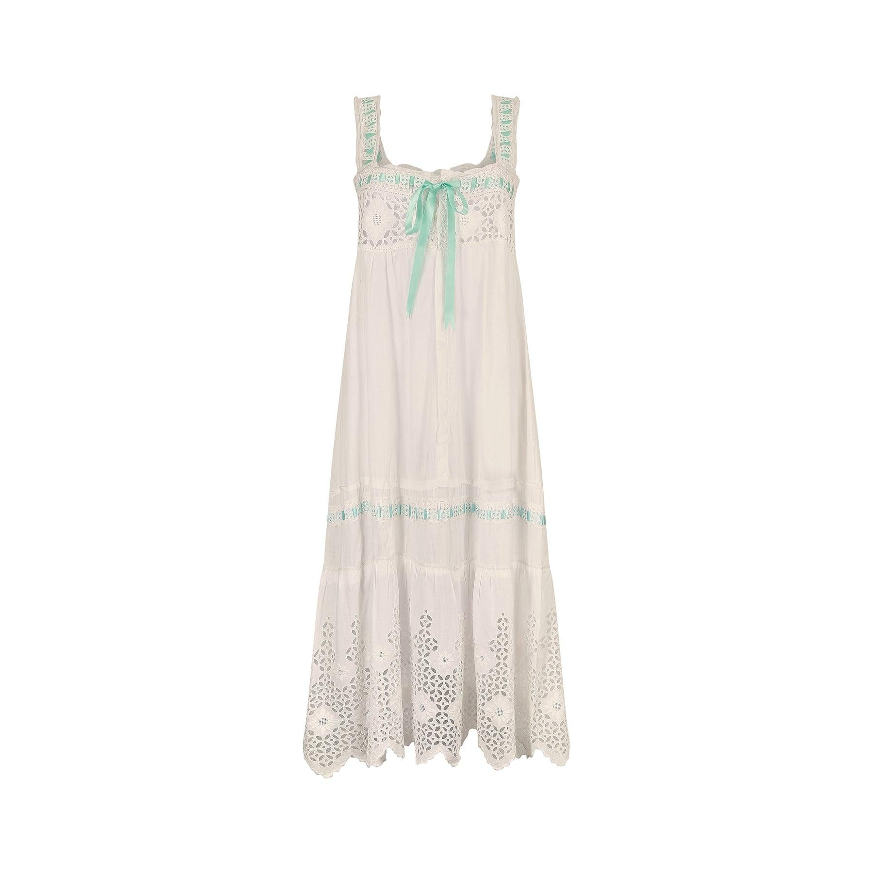 This is a really good 1920s cotton whitework slip dress. It is incredibly detailed and the execution of the eyelet work is exceptional. The dress may have been an underdress for a tea gown but was probably worn as nightwear and features this eyelet