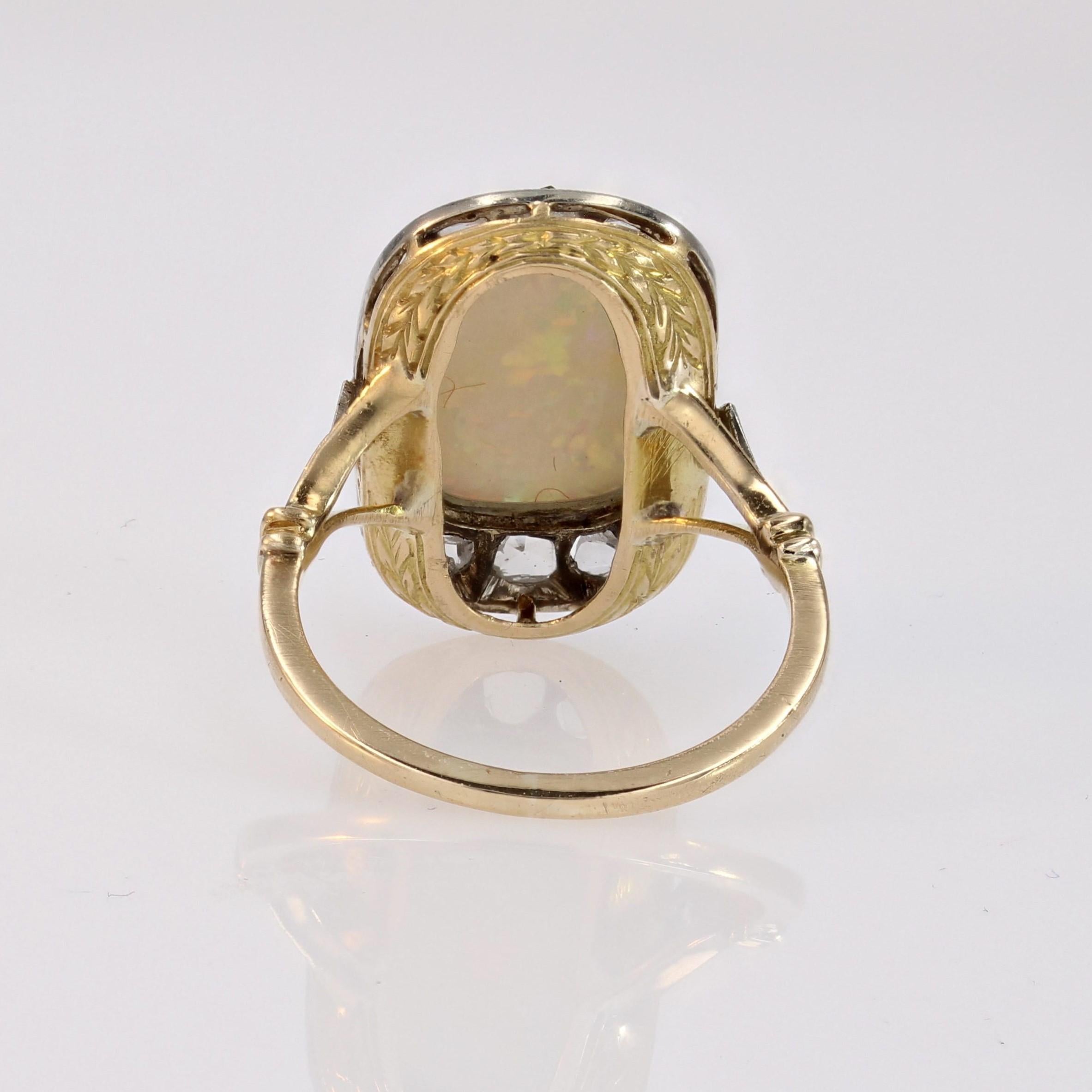 1920er Jahre Platinring mit weißem Opal und Diamanten aus 18 Karat Gelbgold im Angebot 13