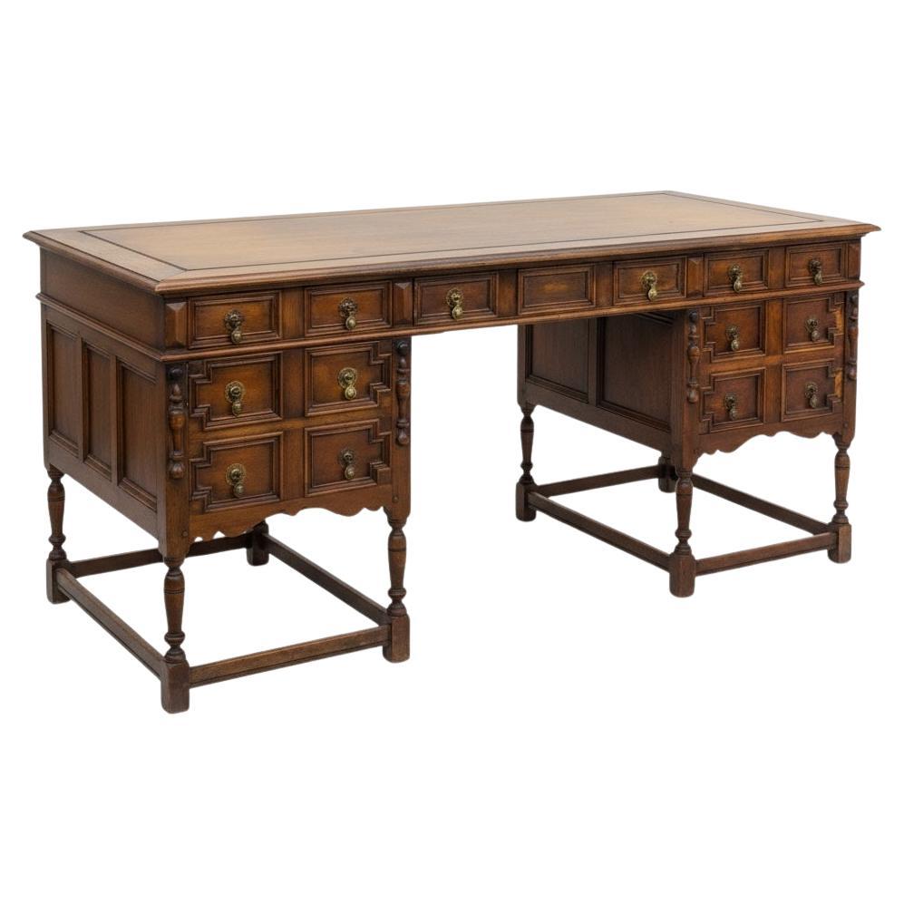 1920s William And Mary Style Carved Walnut Executive Desk By R.G. Kittinger en vente