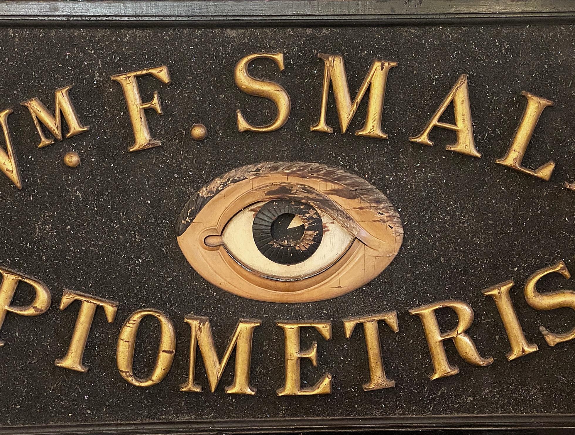 This great 1920s optometrist sign is double sided and in excellent condition. Made of all wood with gilded letters and a carved eye in the center. This can be seen at our 333 W 52nd St location, located in the Theater District West of Manhattan.