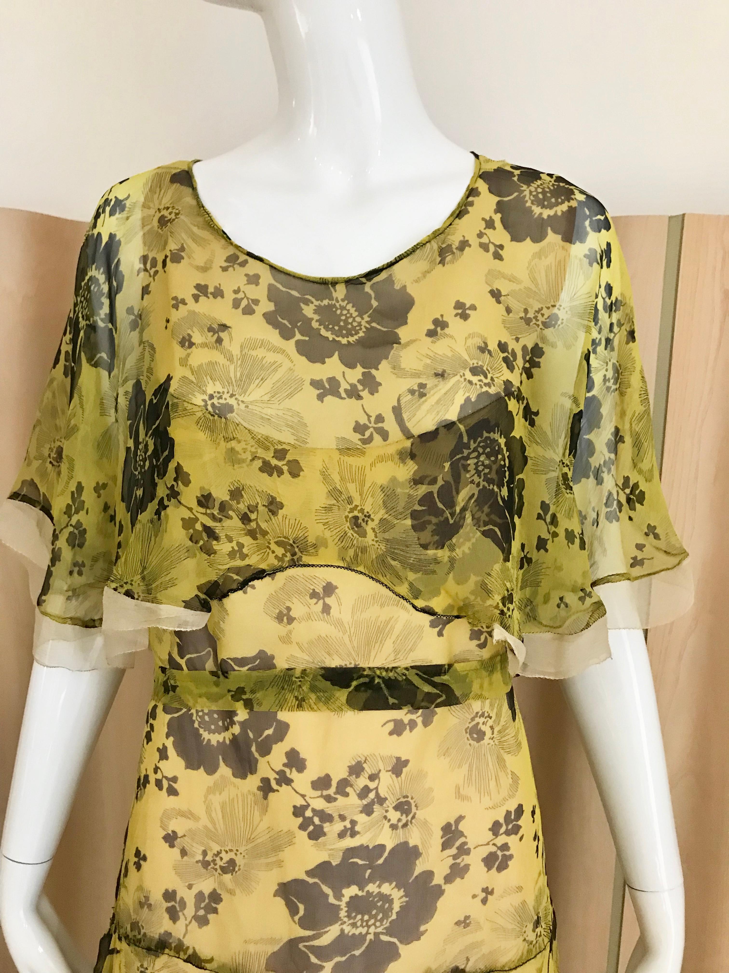 1920s Yellow and brown floral print silk day dress. 
Size: 6-8 dress comes with silk belt