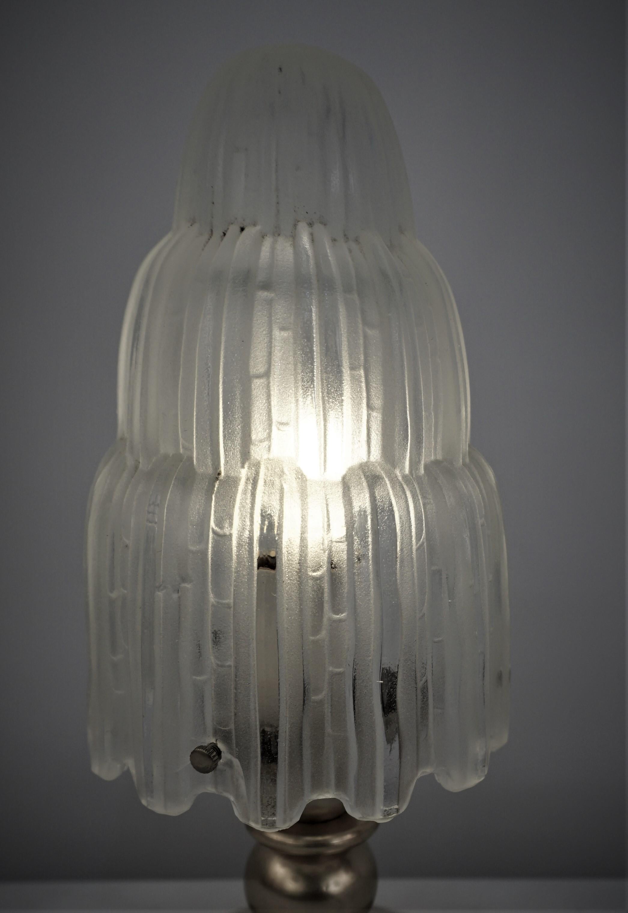 Beautiful Patit art deco waterfall table lamp by Sabino, Paris. clear frost glass on bronze base.