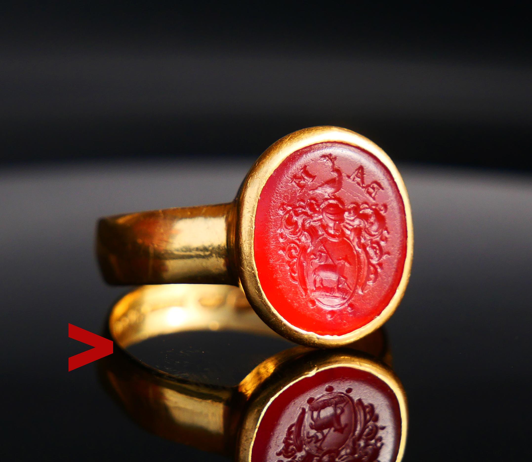 Great Signet Ring with Coats of Arms of Christ Intaglio set in solid 23K Gold.

Agnus Dei with the vexillum on the shield and 3 dots / trinity symbol bellow.

Knight's Armor and Helmet with plumage. On top - Ararat Dove holding a branch with leaves.