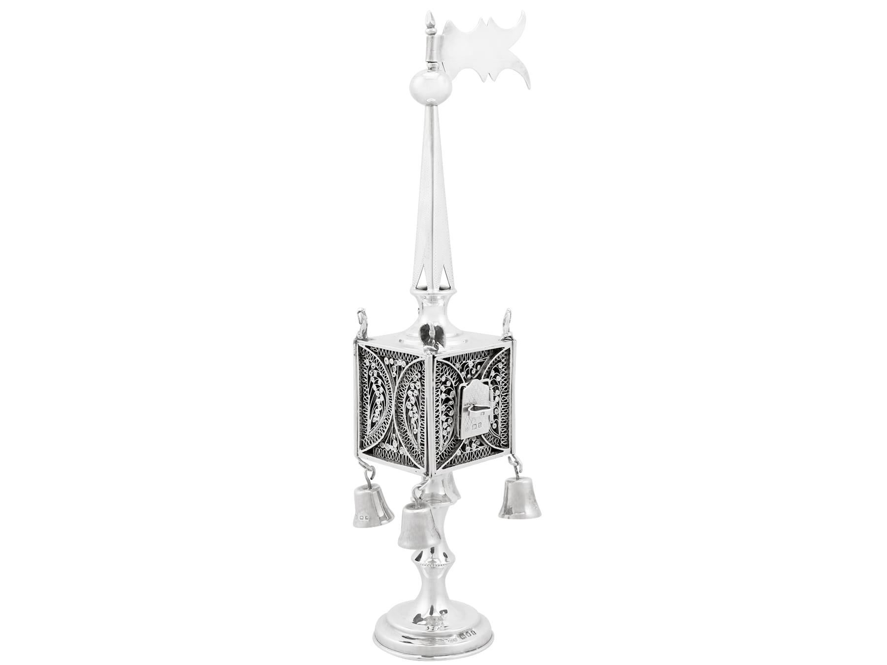 An exceptional, fine and impressive antique George V English sterling silver spice tower, an addition to our silver Judaica collection.

This exceptional antique George V sterling silver spice box has been modeled in the form of a tower.

The