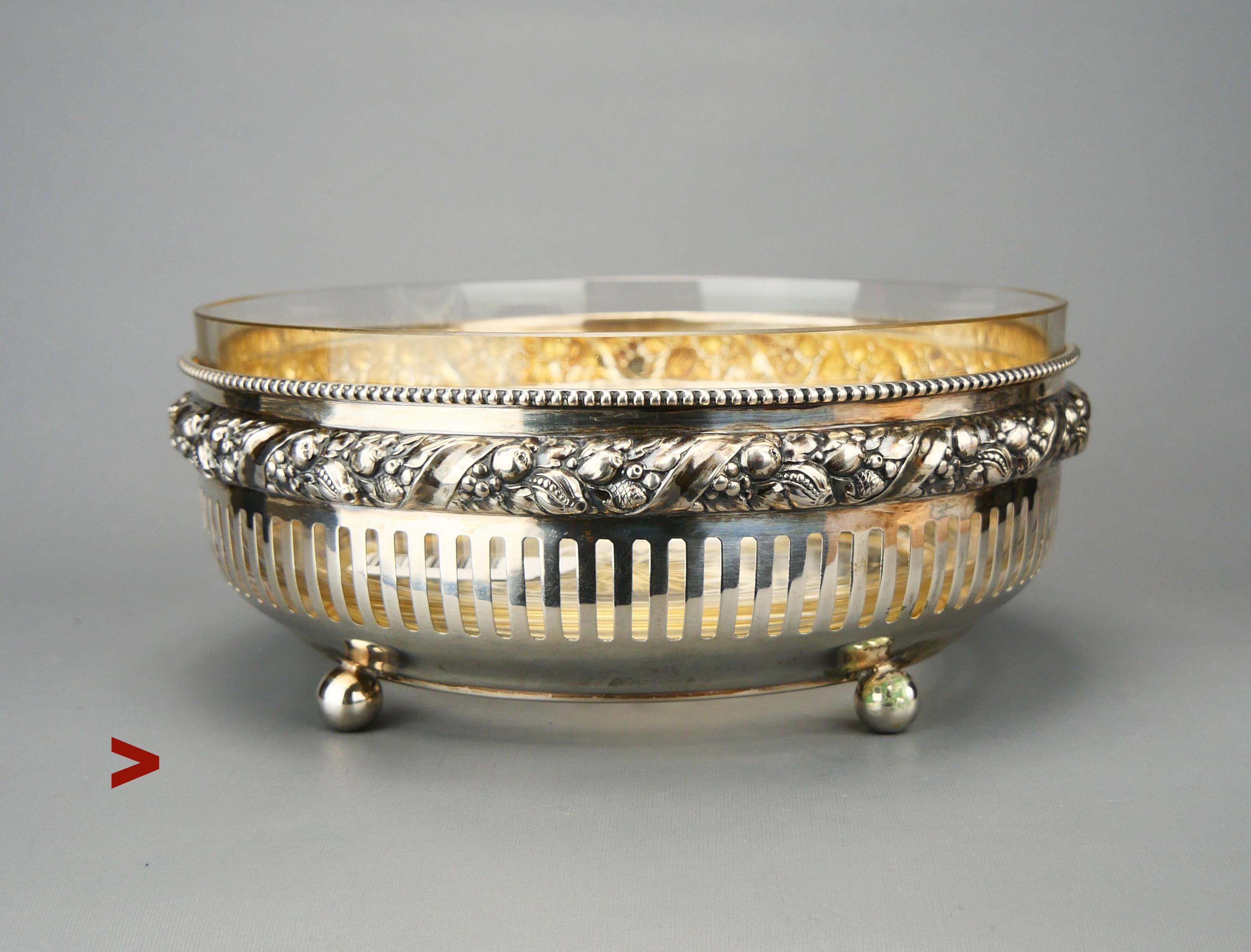 Fine solid Silver and original removable cut crystal glass Bowl in style popular in Europe of 1920s - 1930s. Continuous garland filled with fruits and flowers is very decorative, this bowl is perfect to serve fruits .

Swedish hallmarks confirming