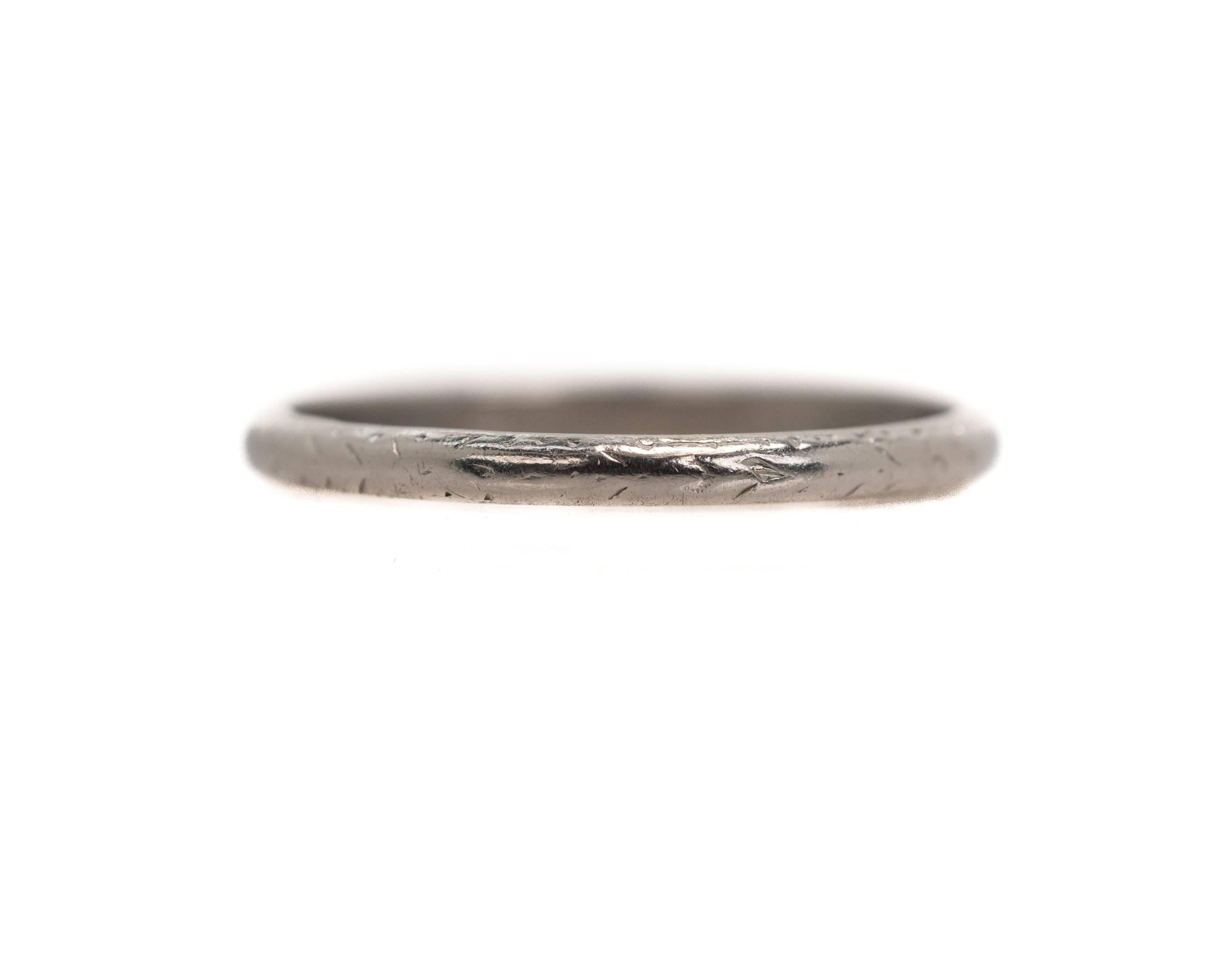 Thin Platinum Wedding Band, 1921 Art Deco Ultra Thin Band

This 1 millimeter wide Ultra Thin Wedding Band features a hand etched geometric pattern. The etching is faint which is common due to age and use. The ring is in excellent condition. It pairs