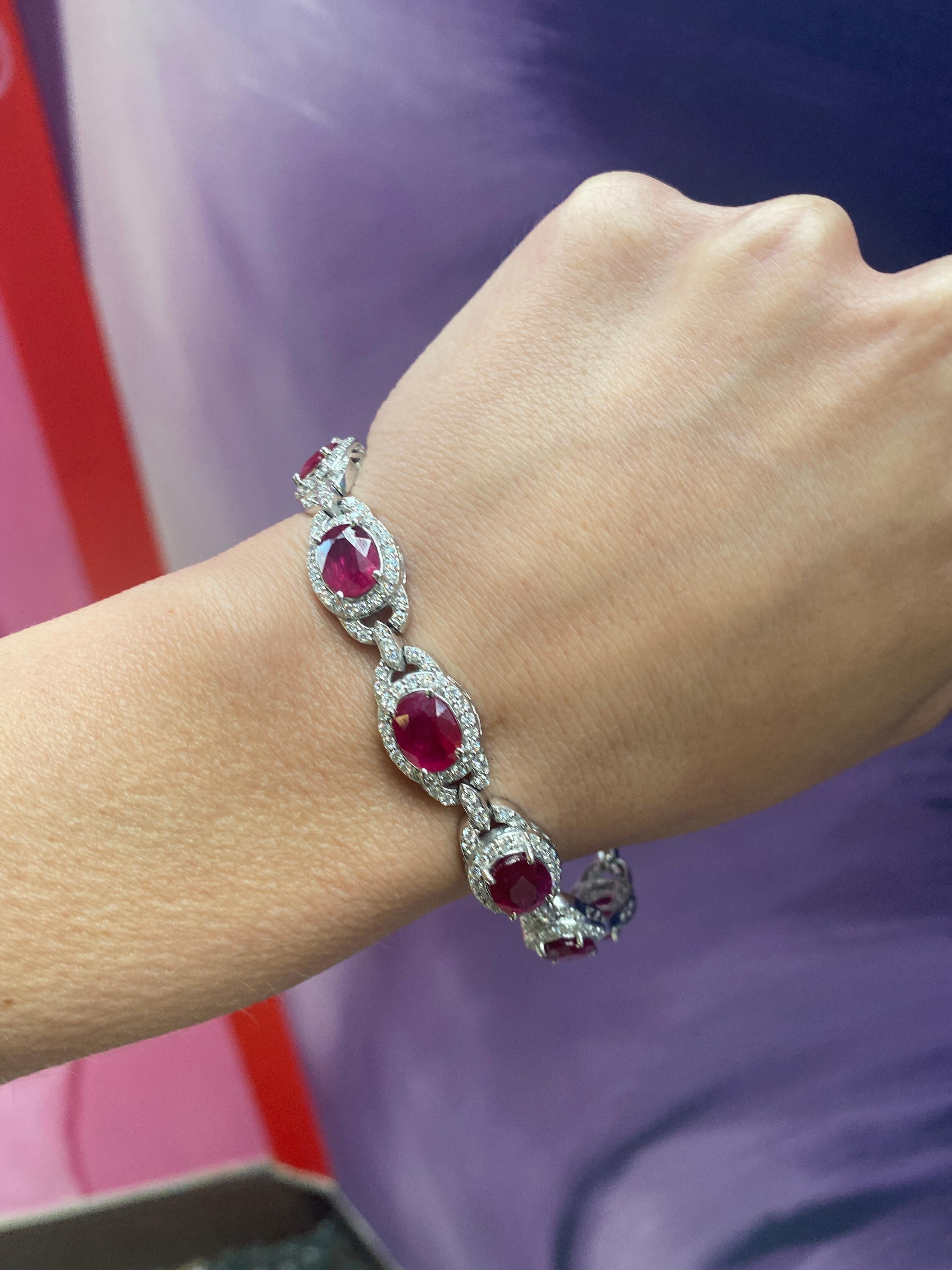 Oval Cut 19.21 Carat Oval Ruby with 4.48 Carats of Round Pave Diamonds, 14K White Gold